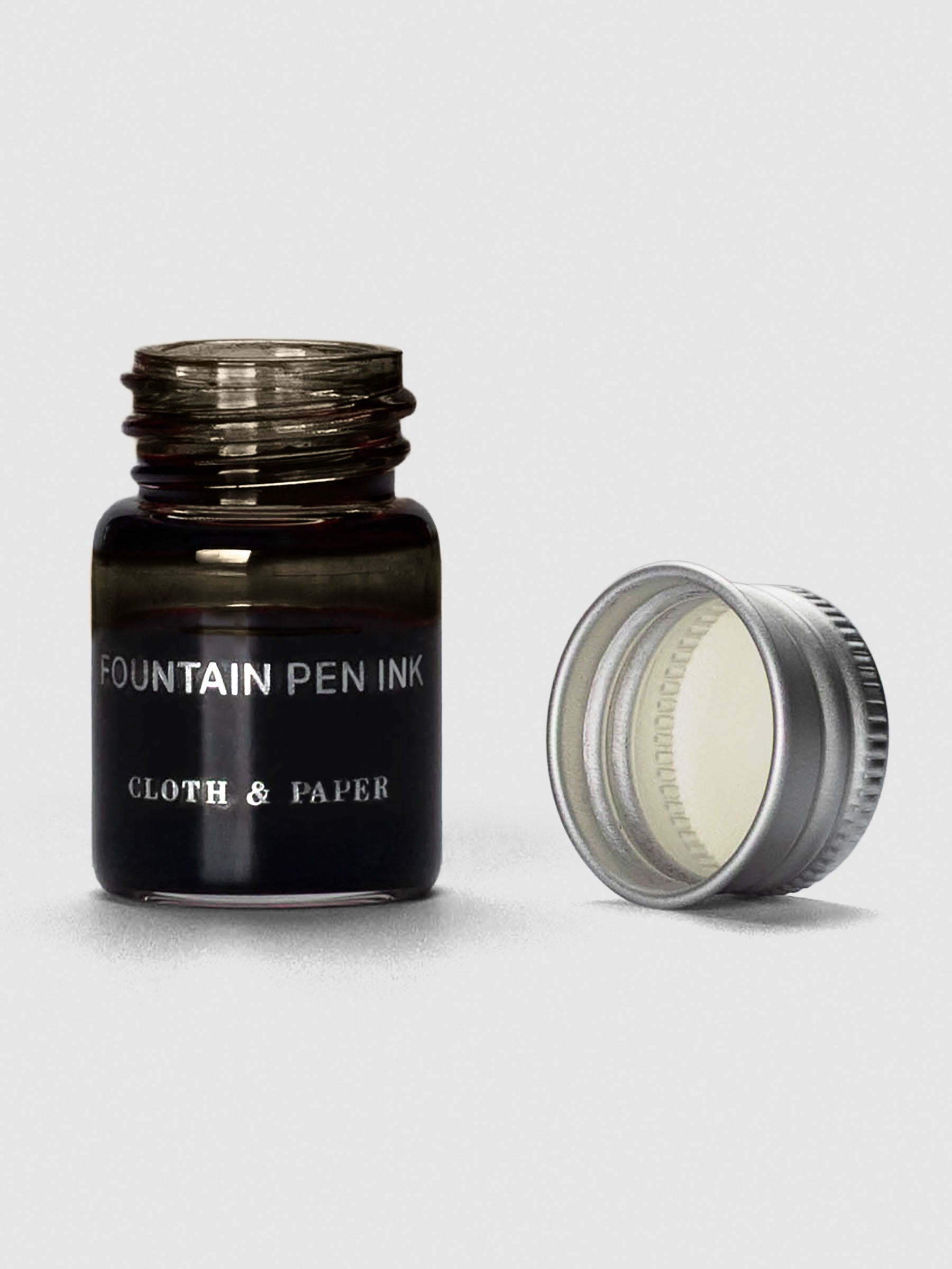 Espresso Mini Fountain Pen Ink shown with cap off bottle.