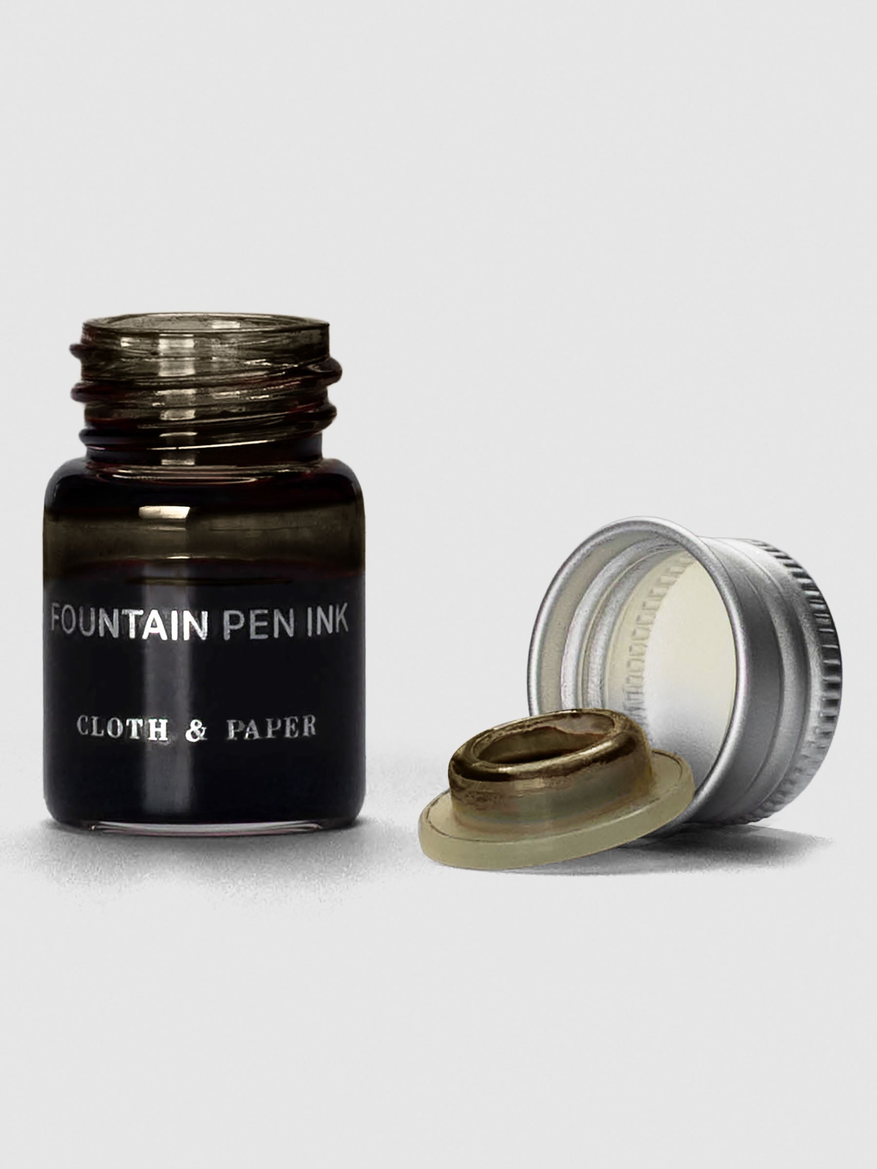 Espresso Mini Fountain Pen Ink shown with cap off bottle.