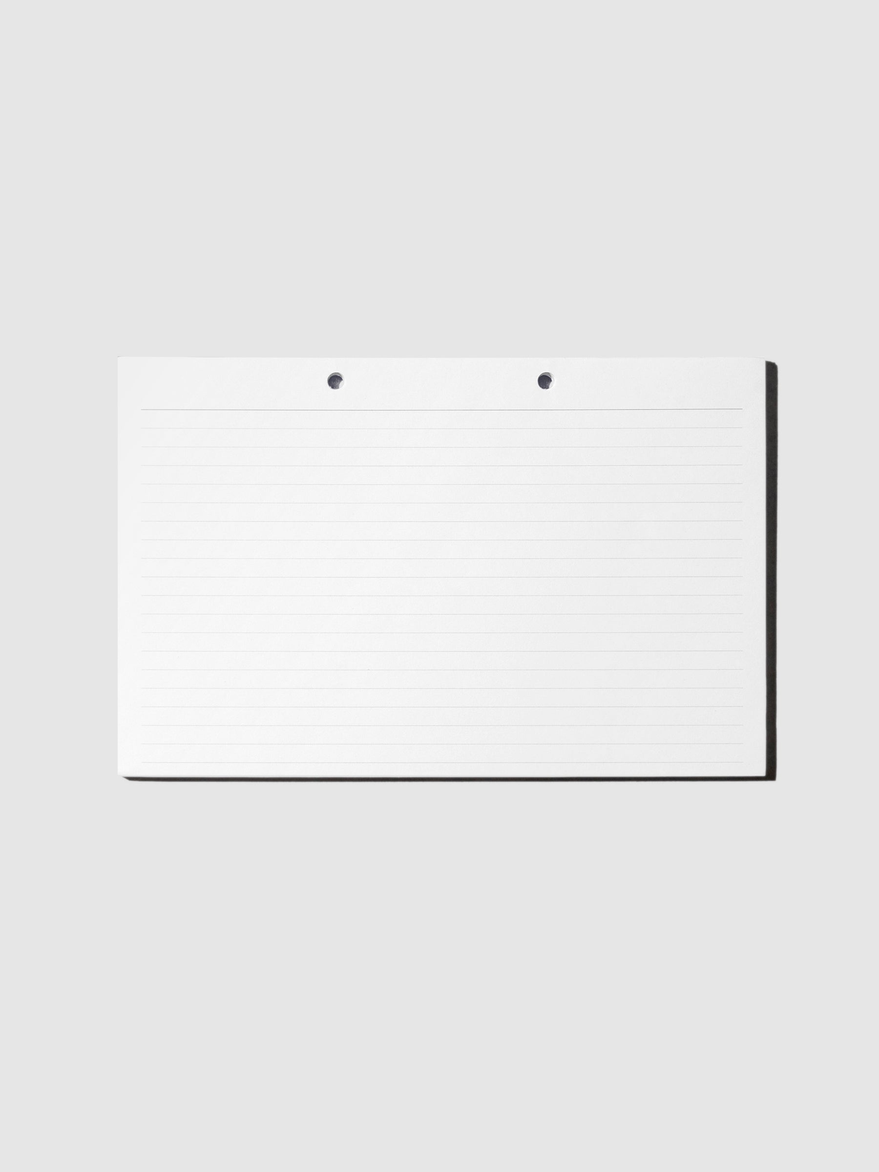 Modern Bound Notepad Insert Refills, lined, resting on a light neutral background