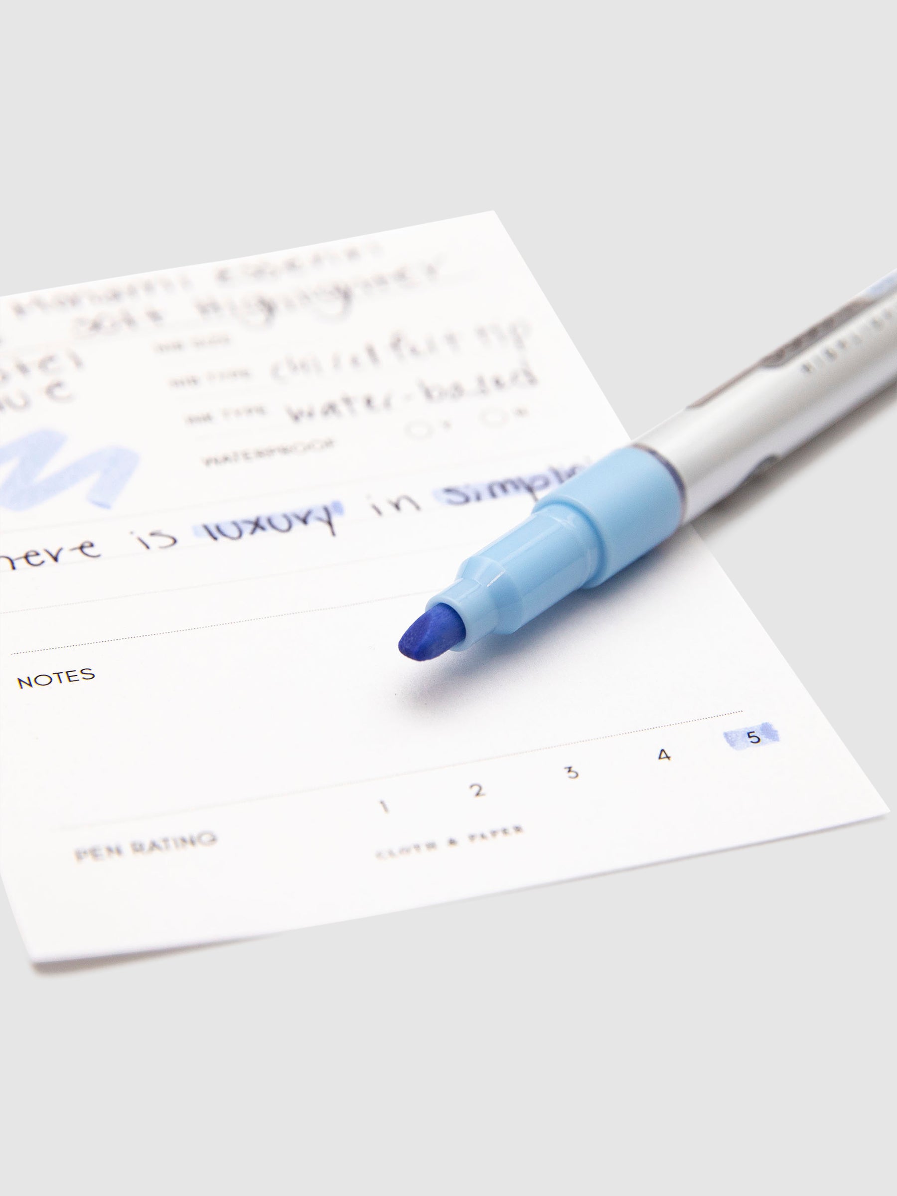 Monami Essenti Soft Highlighter, Pastel Blue, Cloth & Paper. Close up on highlighter chisel tip.