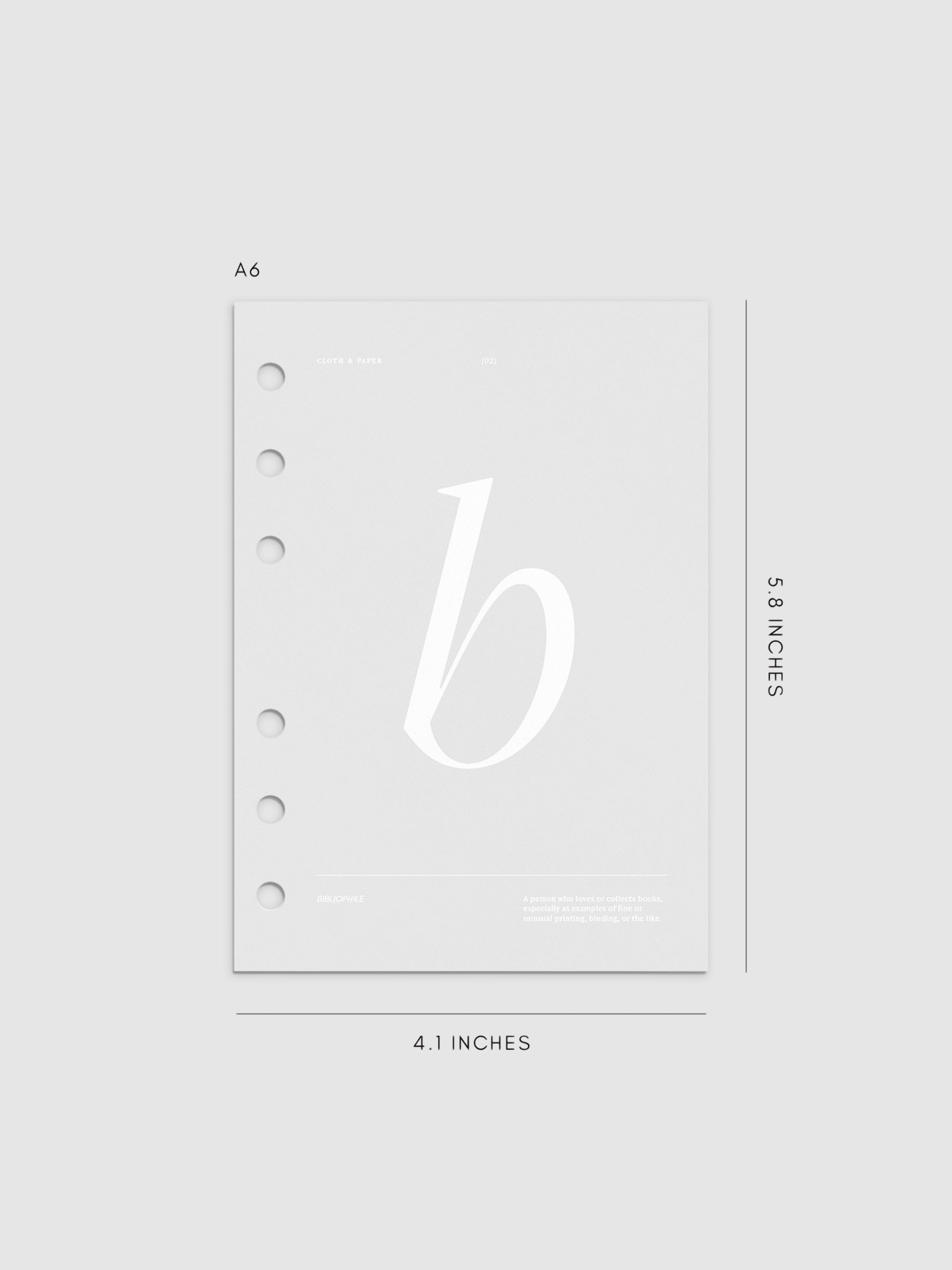 Monogram Vellum Planner Dashboard B in A6 displayed on a neutral