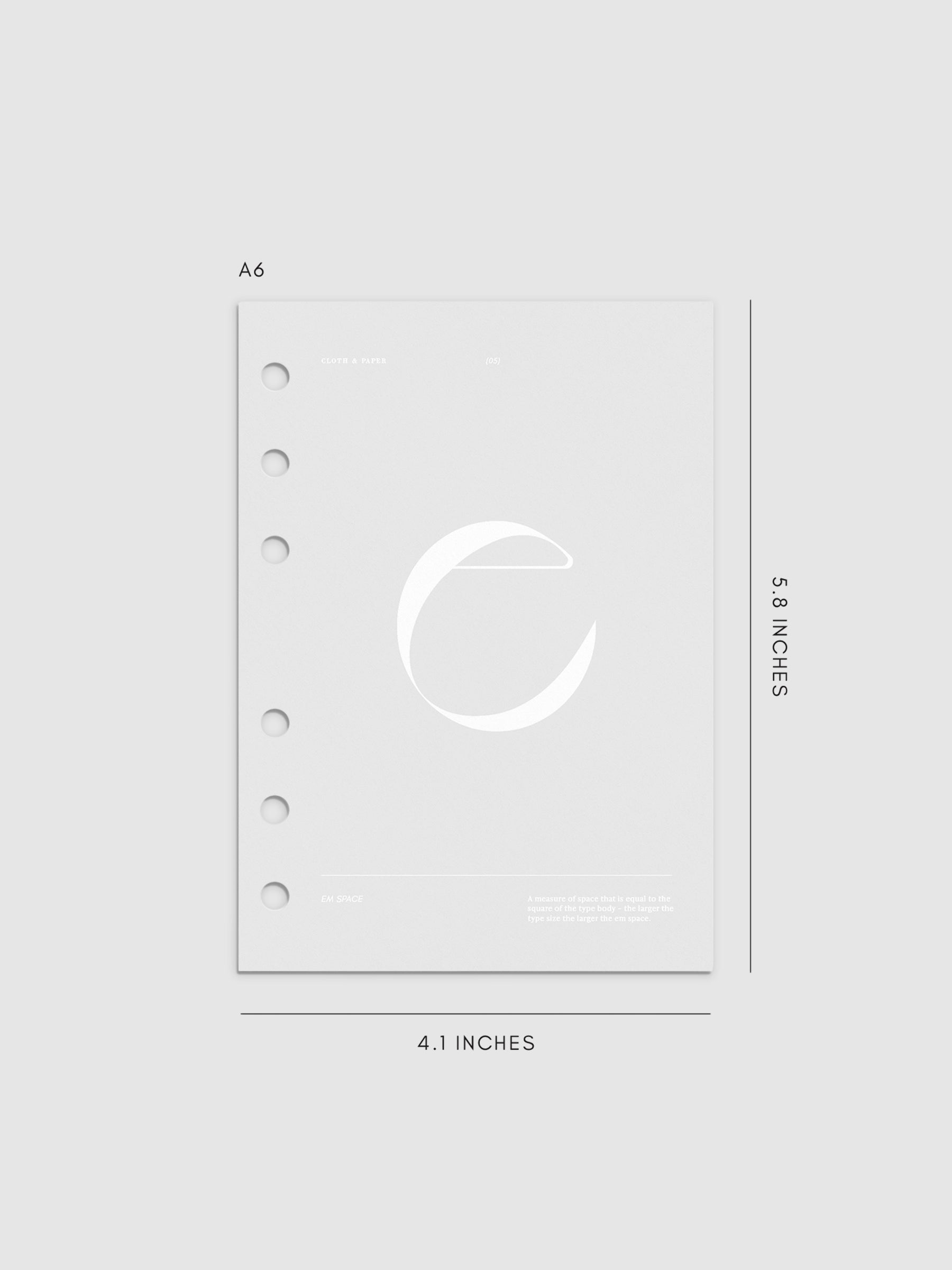 Monogram Vellum Planner Dashboard E in A6 displayed on a neutral background.