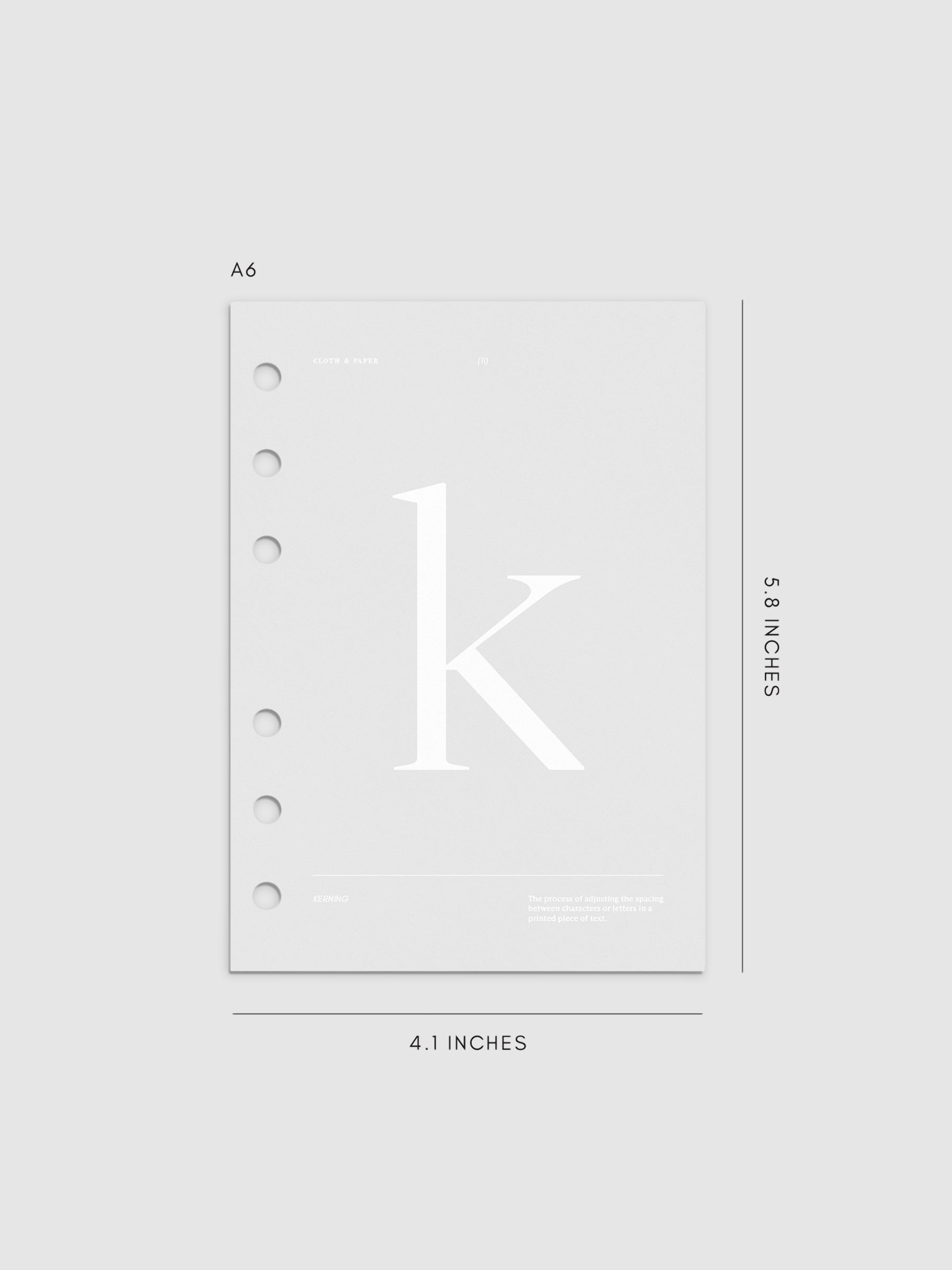 Monogram Vellum Planner Dashboard K in A6 displayed on a neutral background.
