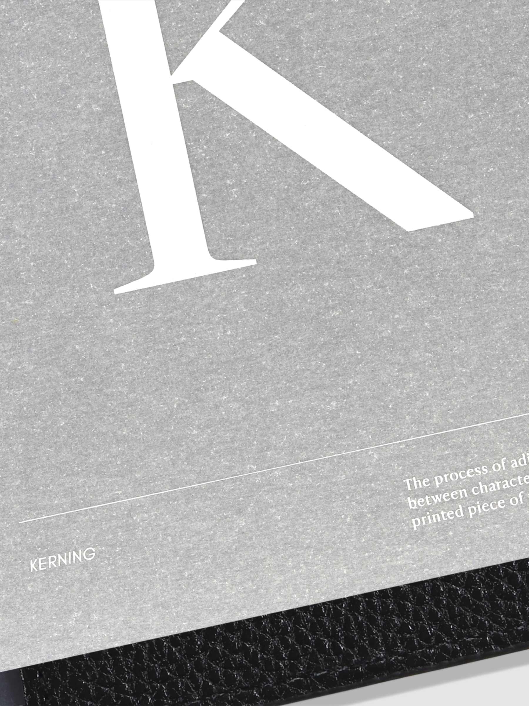 Monogram Vellum Planner Dashboard K in use in a leather planner.