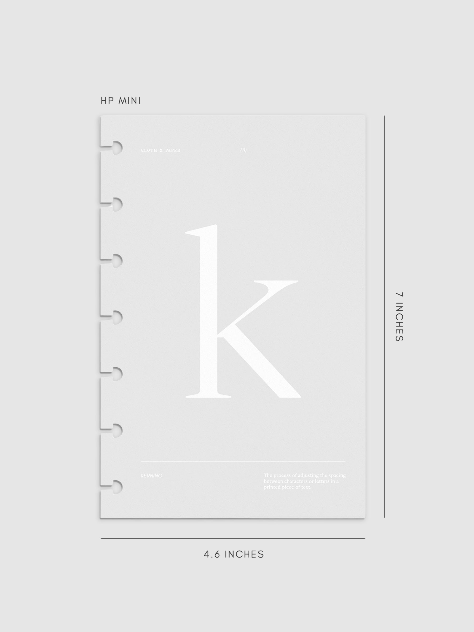 Monogram Vellum Planner Dashboard K in HP Mini displayed on a neutral background.