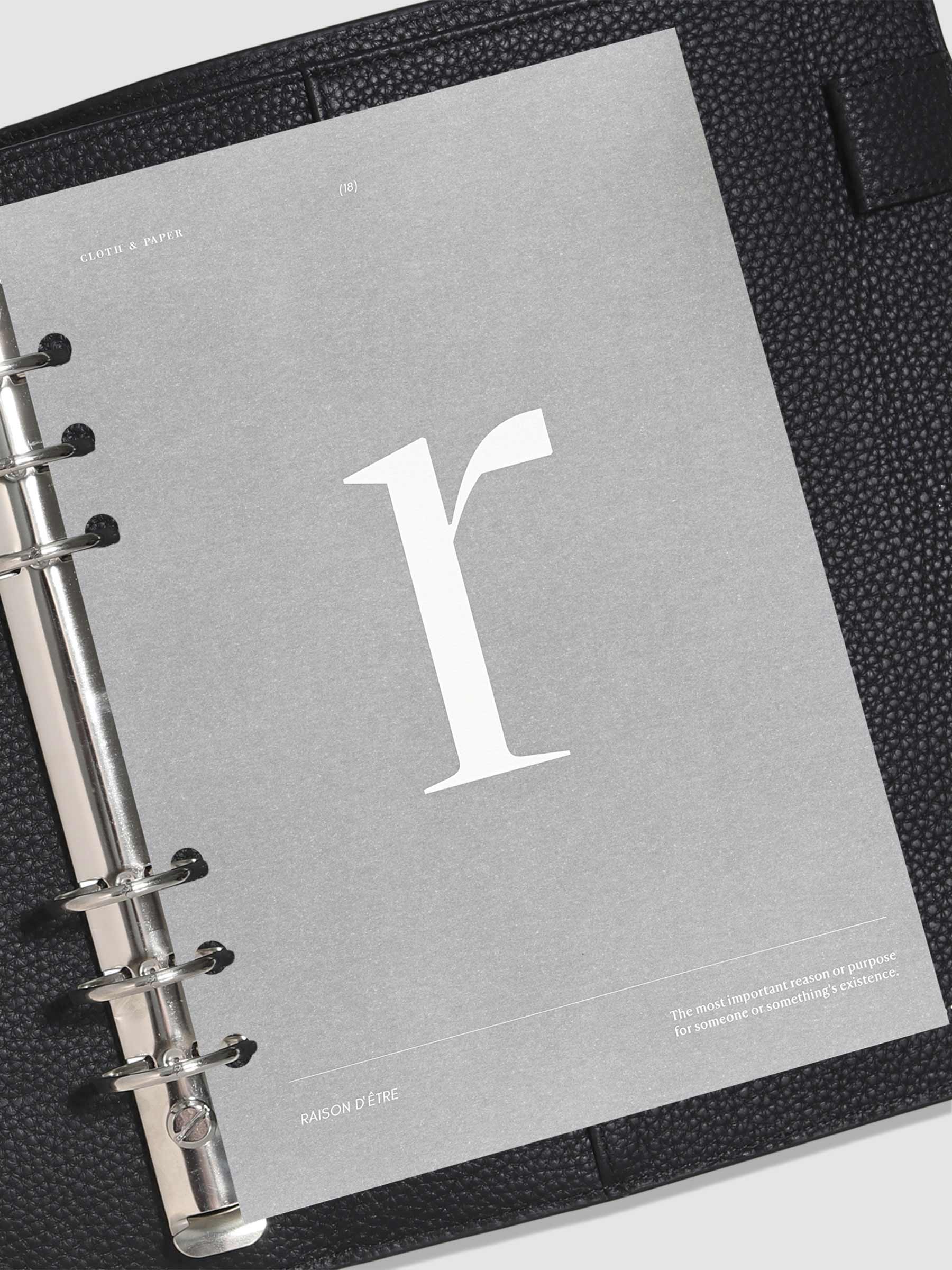 Monogram Vellum Planner Dashboard R in use in a leather planner.