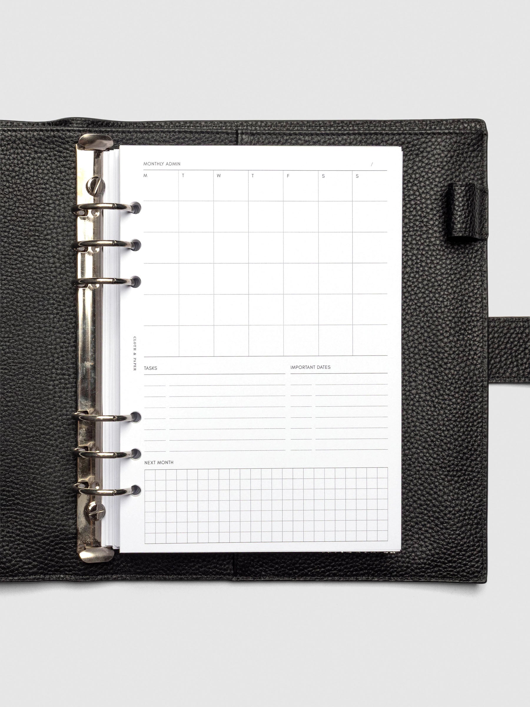 Insert in use inside a black leather planner.