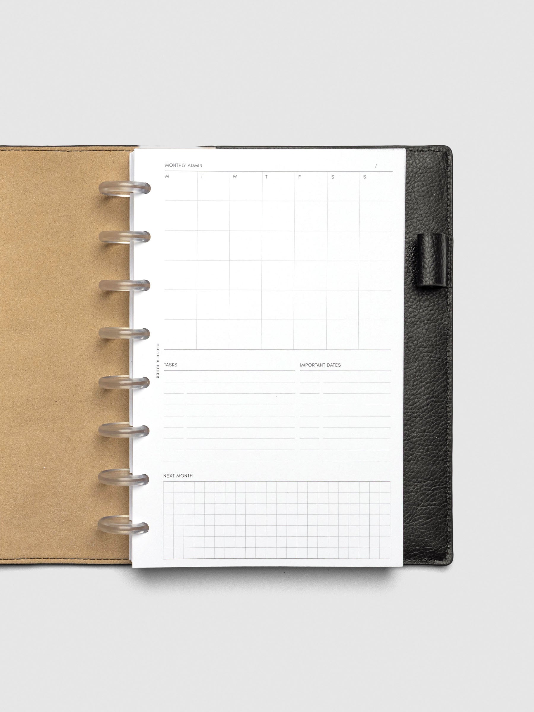 Insert in use inside a black leather planner.