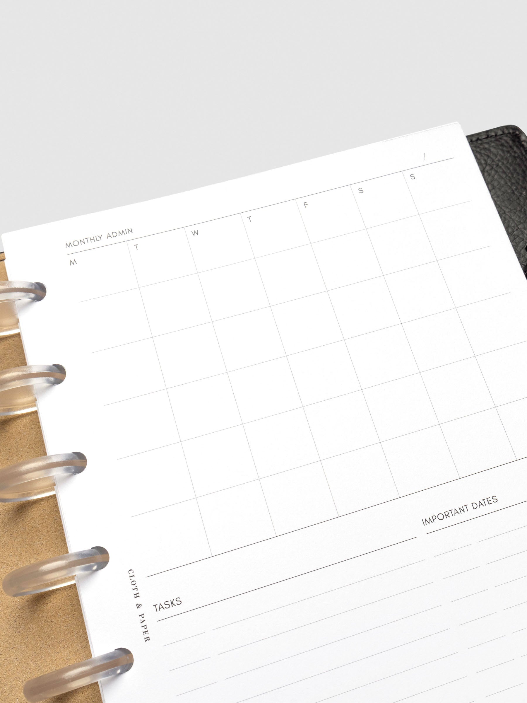 Insert in use inside a black leather planner.