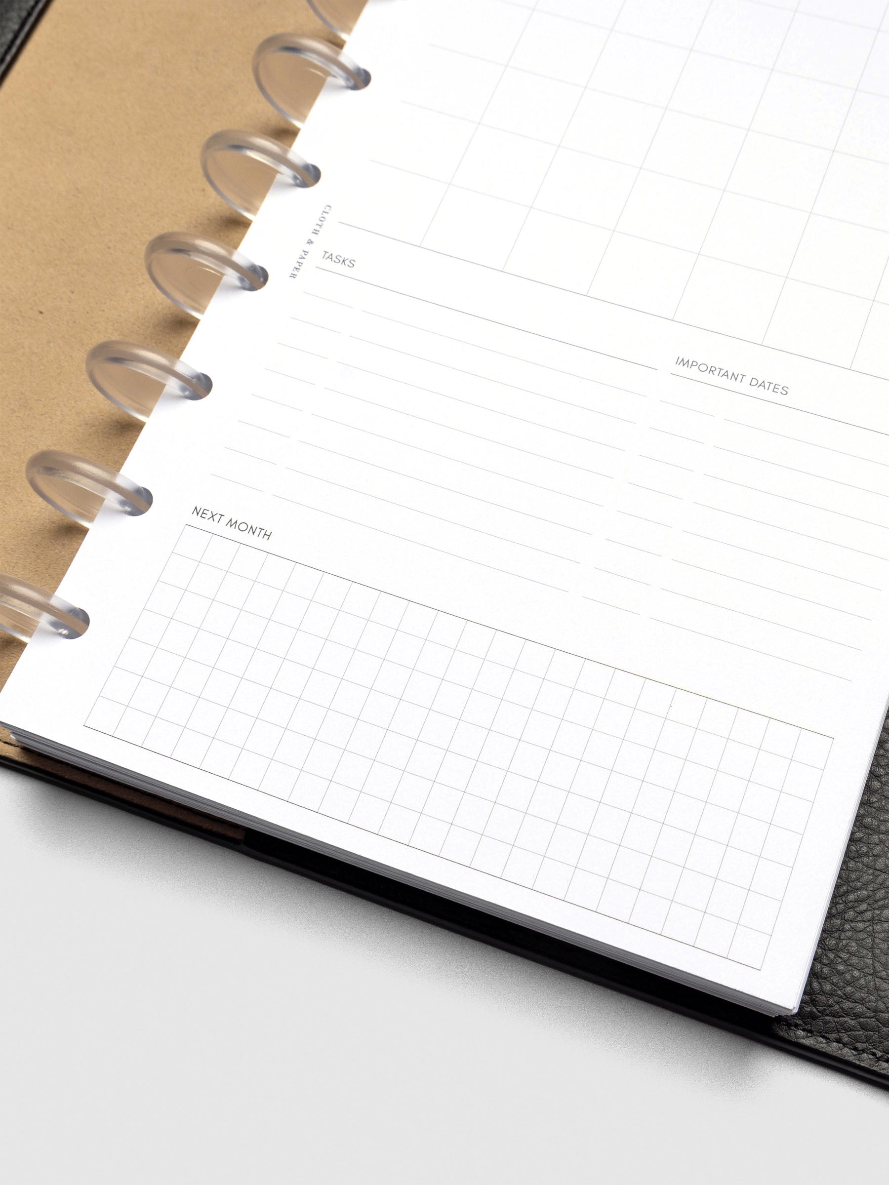 Insert in use inside a black leather planner.
