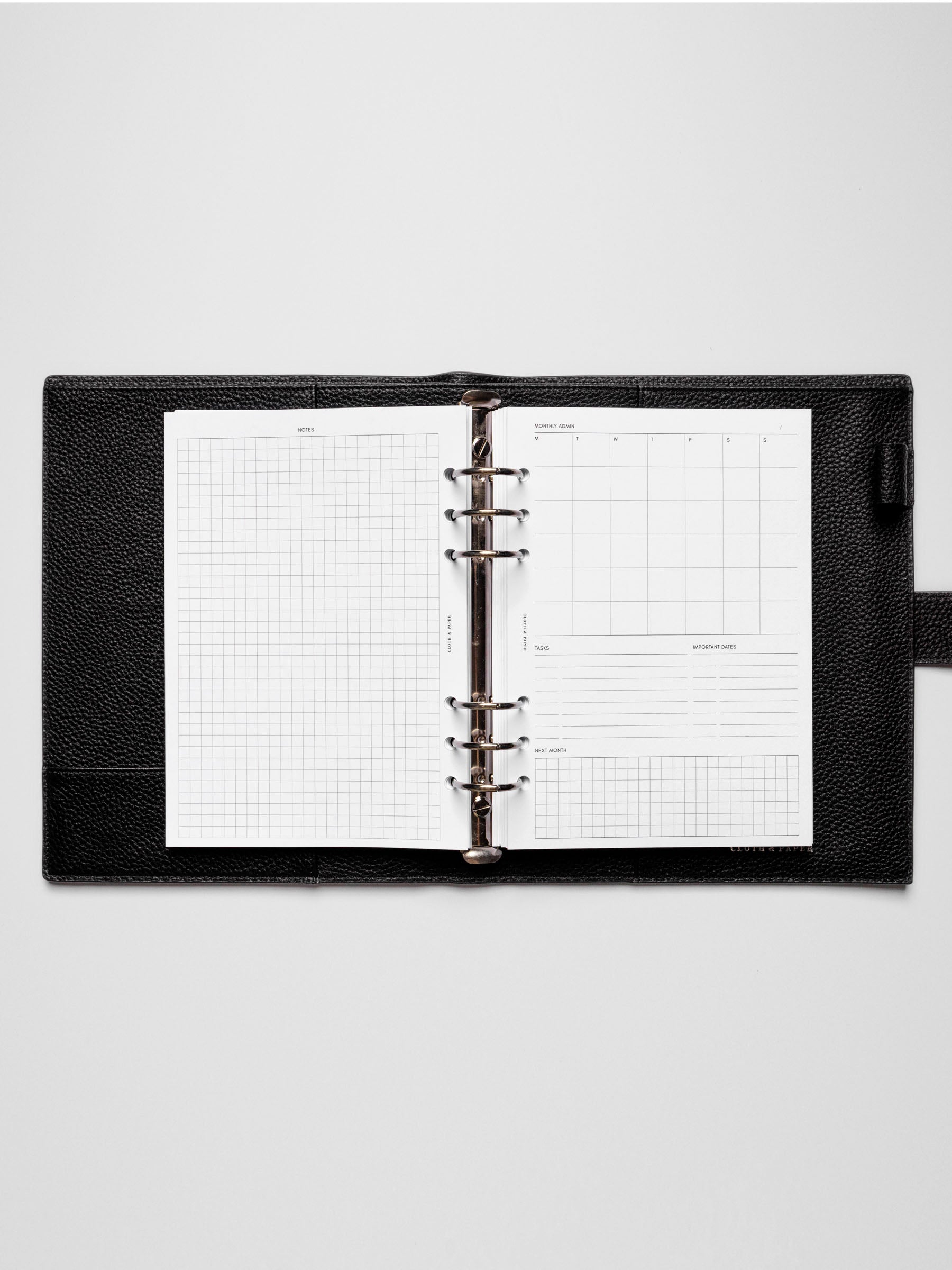 Insert in use inside a black leather planner.