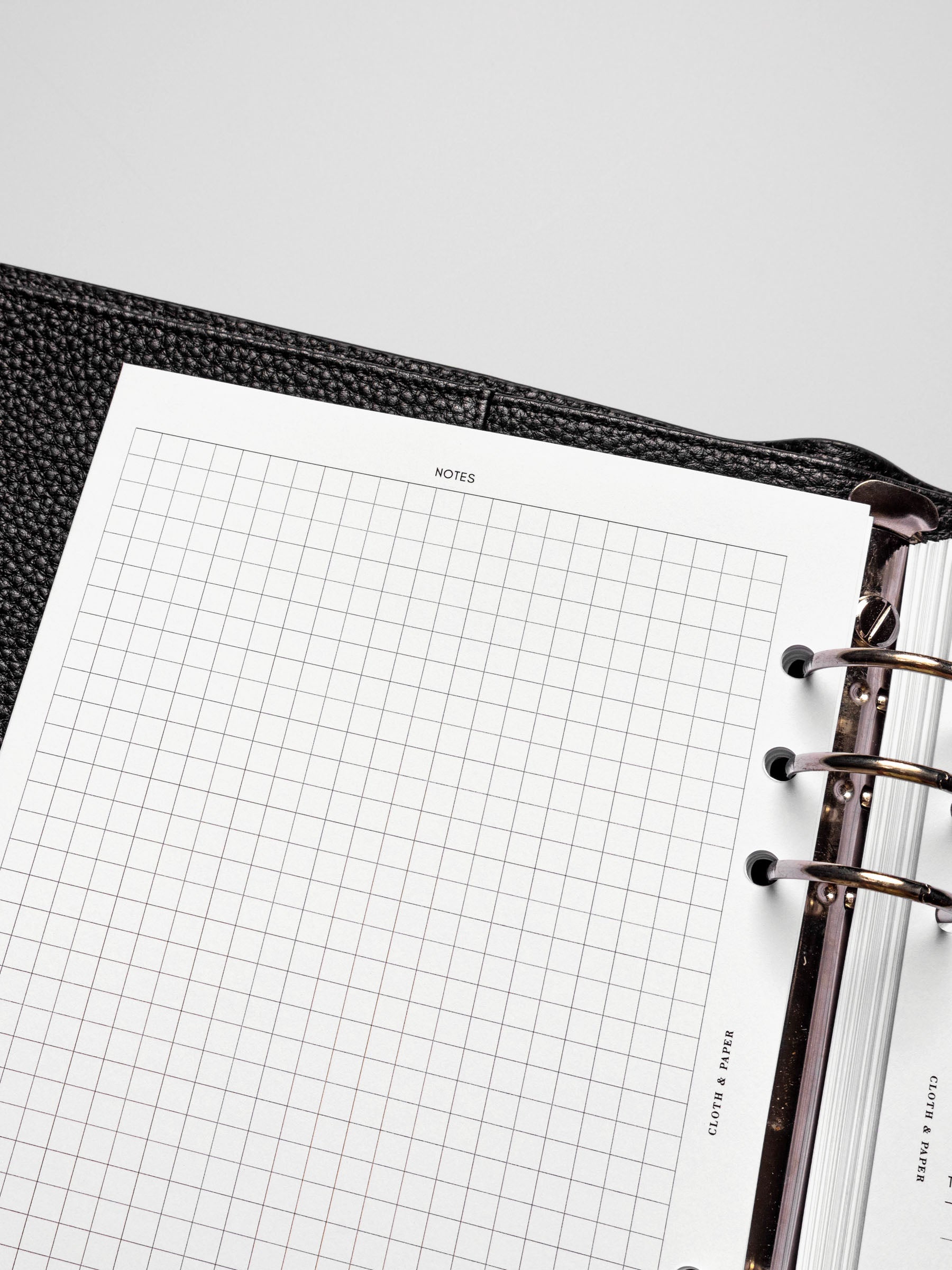 Insert in use inside a black leather planner.