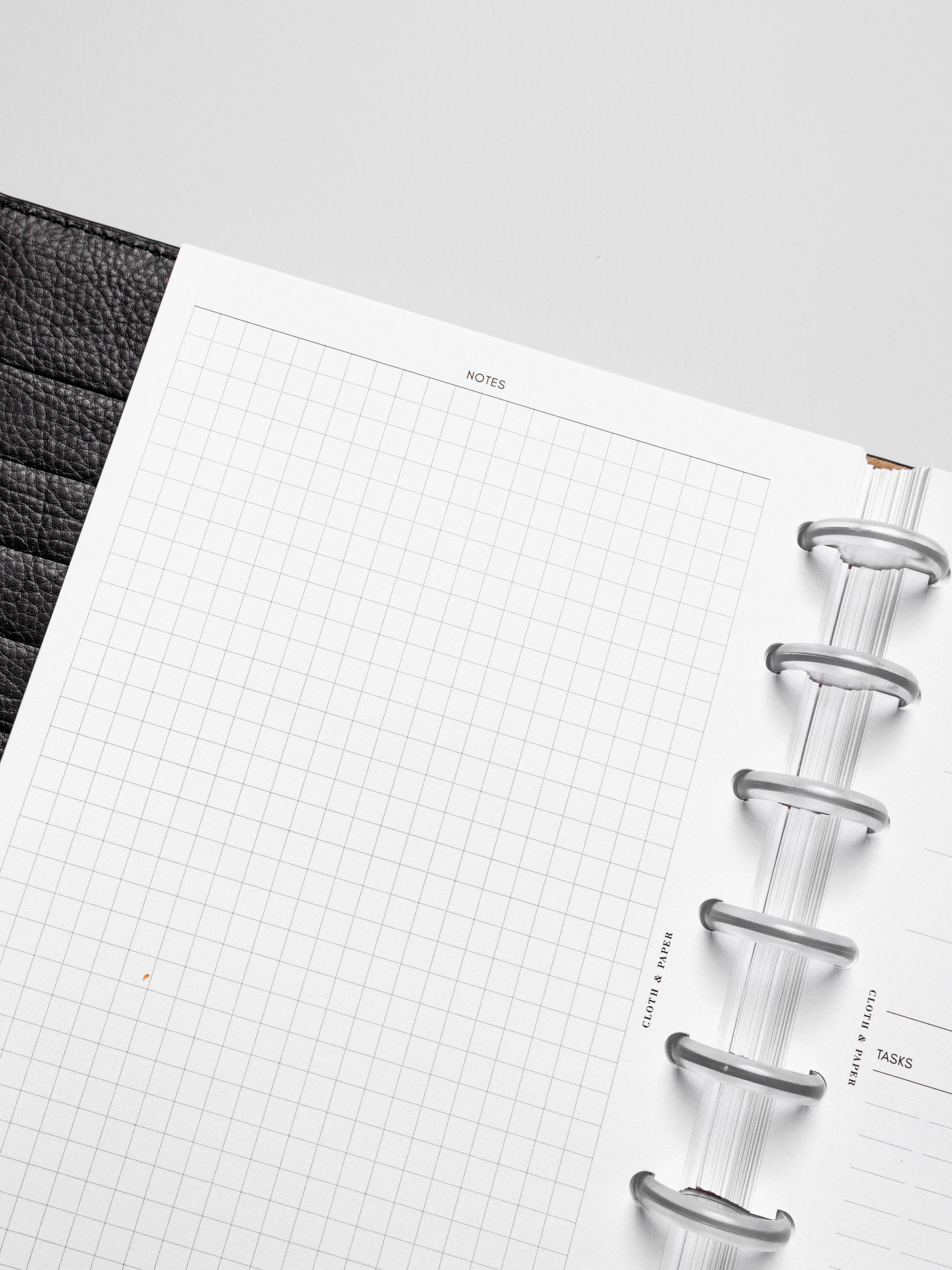 Insert in use inside a black leather planner.