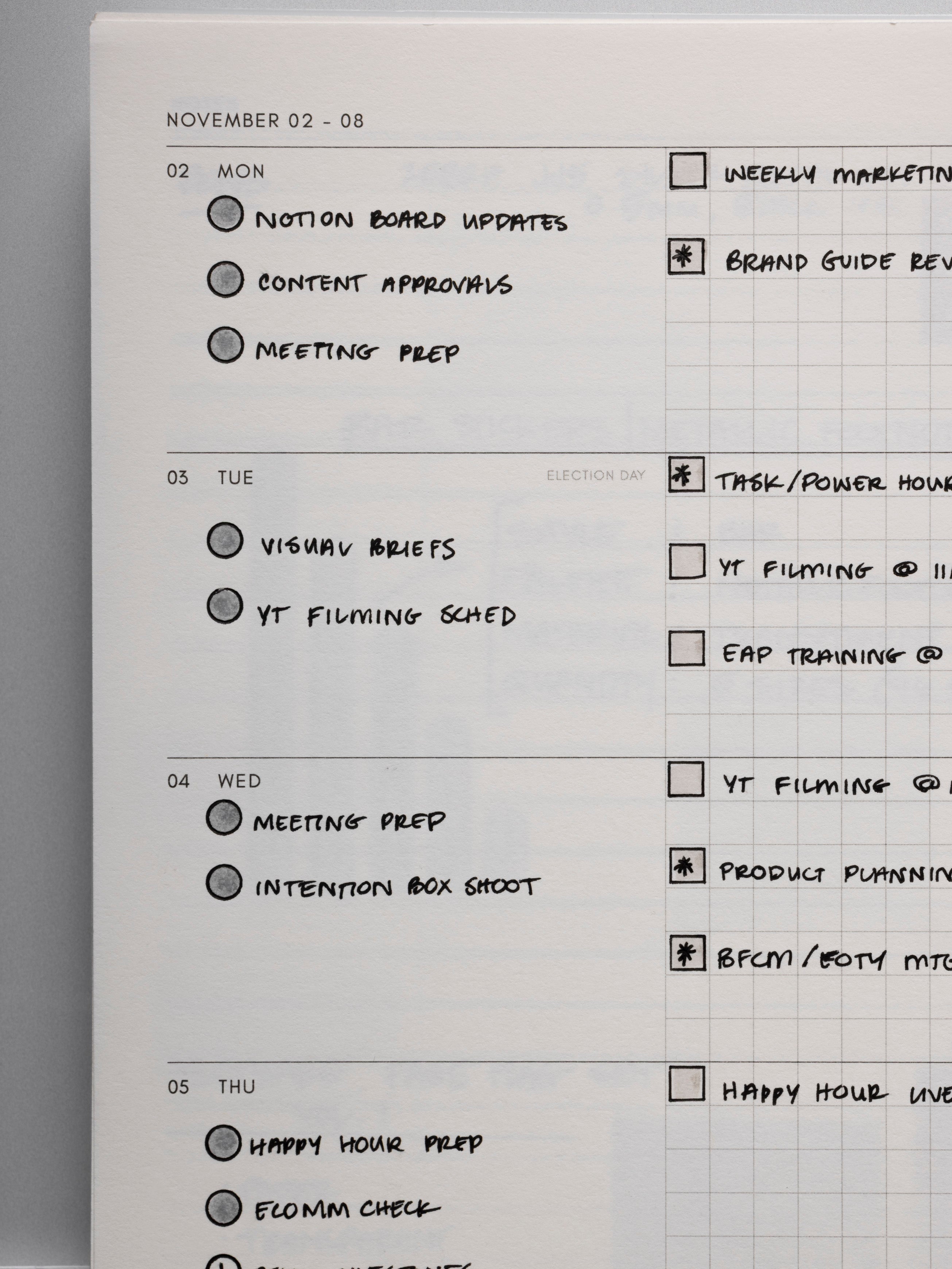 Close up of a weekly layout in the 2026 Weekly Horizontal Notebook | Monday Start | A5 Spiral with handwritten examples of use.