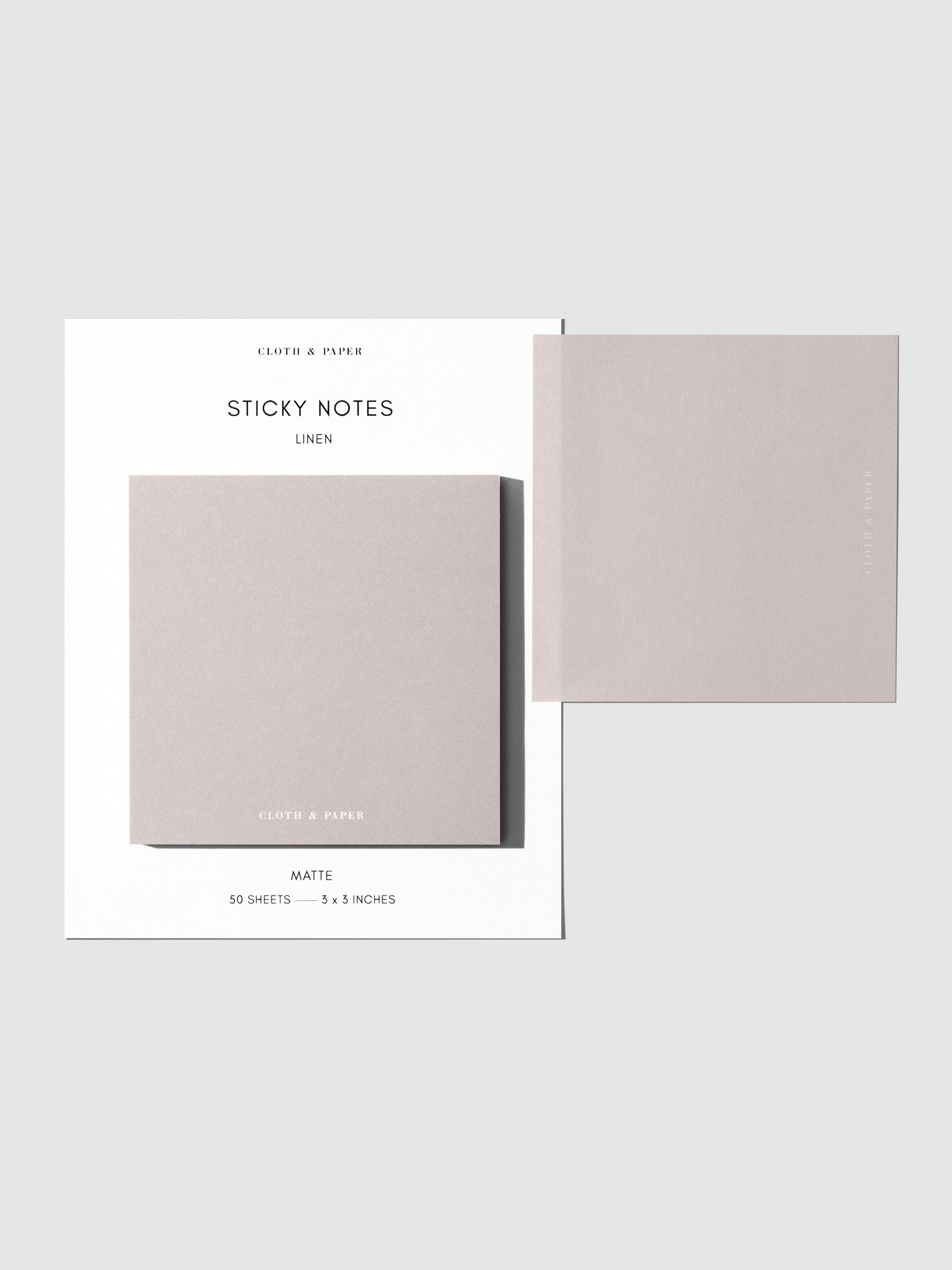 Sticky note set displayed against a neutral background. One note is placed on the packaging's edge. Color shown is Linen.