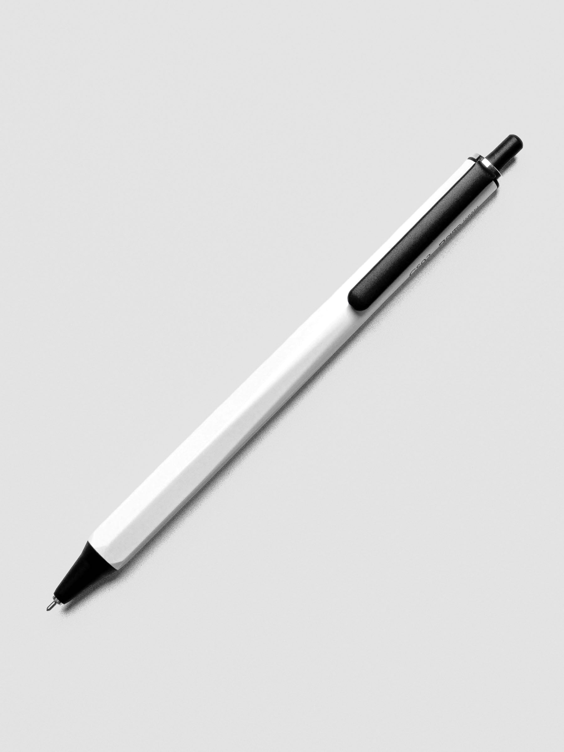 White and black OHTO Roller Gel Pen in 0.5mm nib.