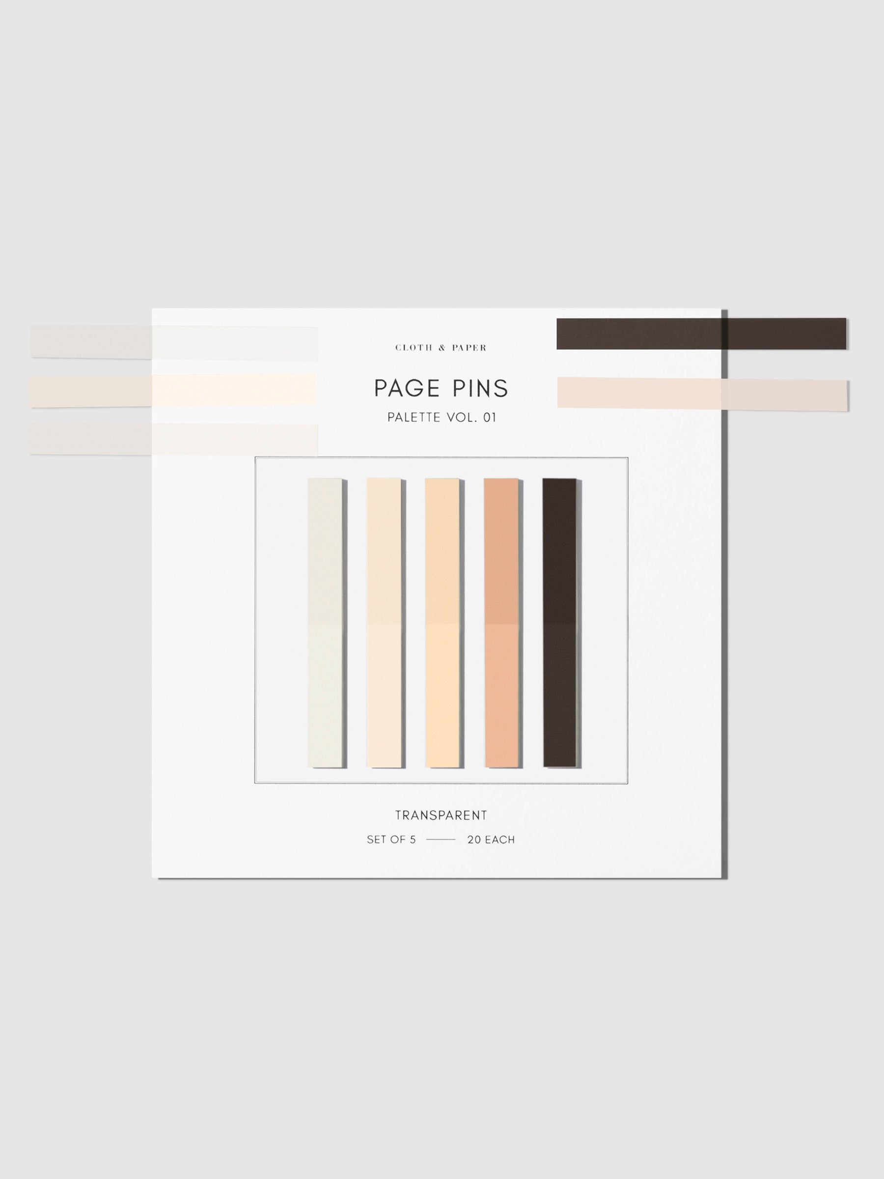 Page pins on their backing with one of each color removed and placed on the side of the backing to show their transparency.