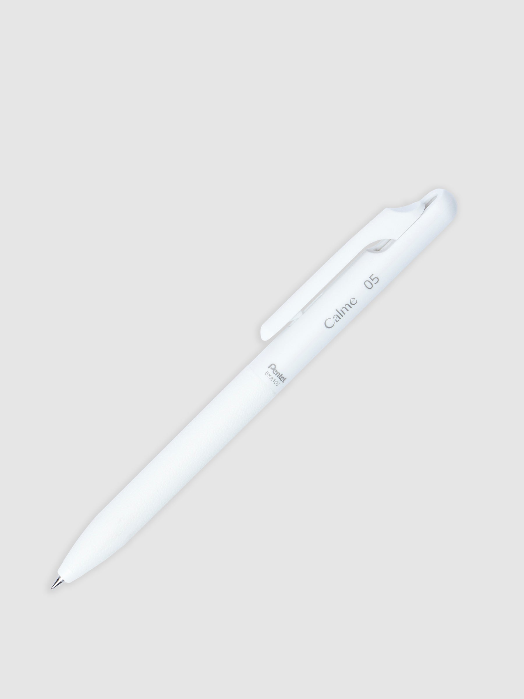 White pen turned to the right against a neutral background.