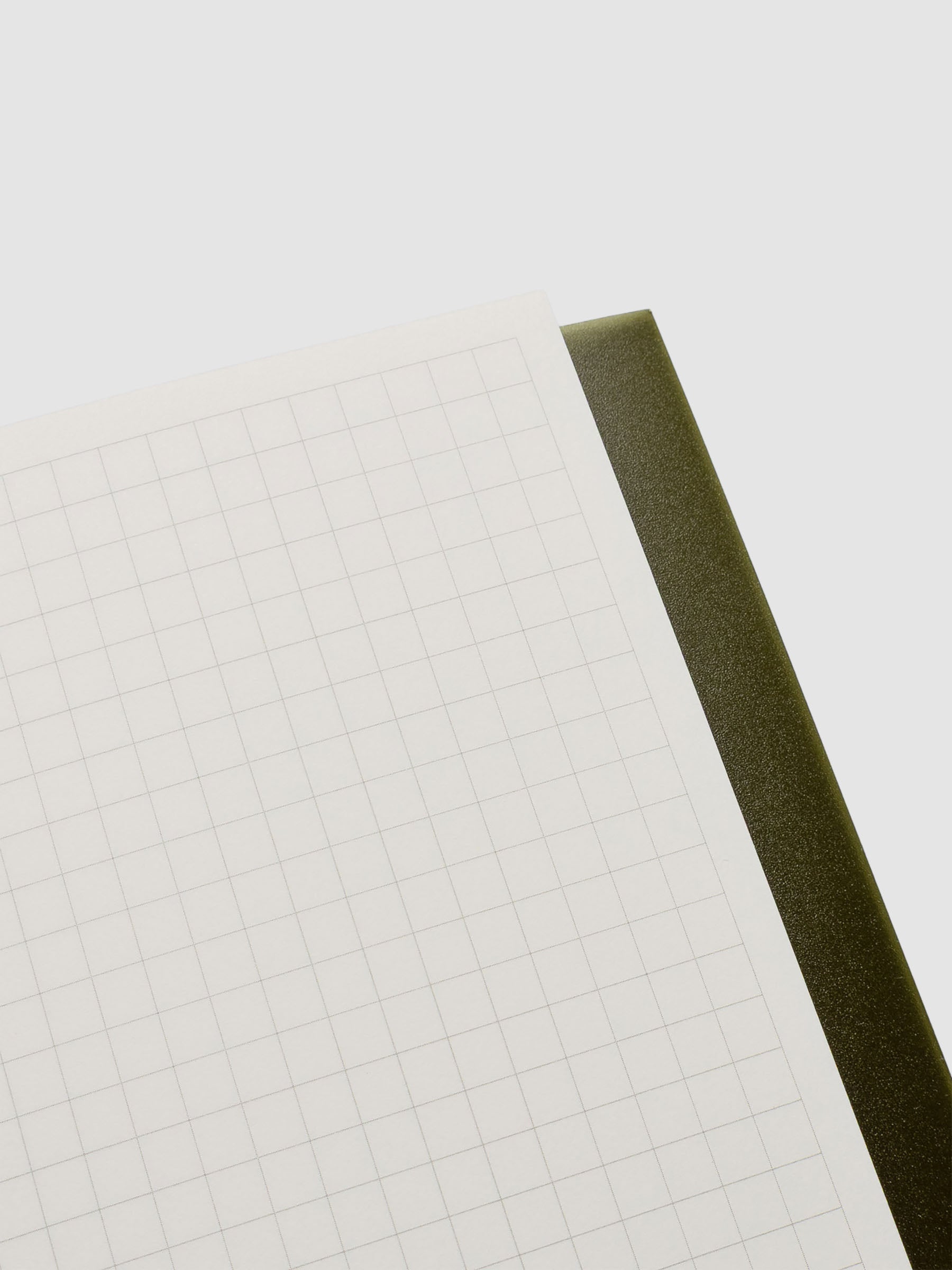 Close up of the open Perfect Bound Notebook | CP Petite | Graph | Olive showing graph style pages.