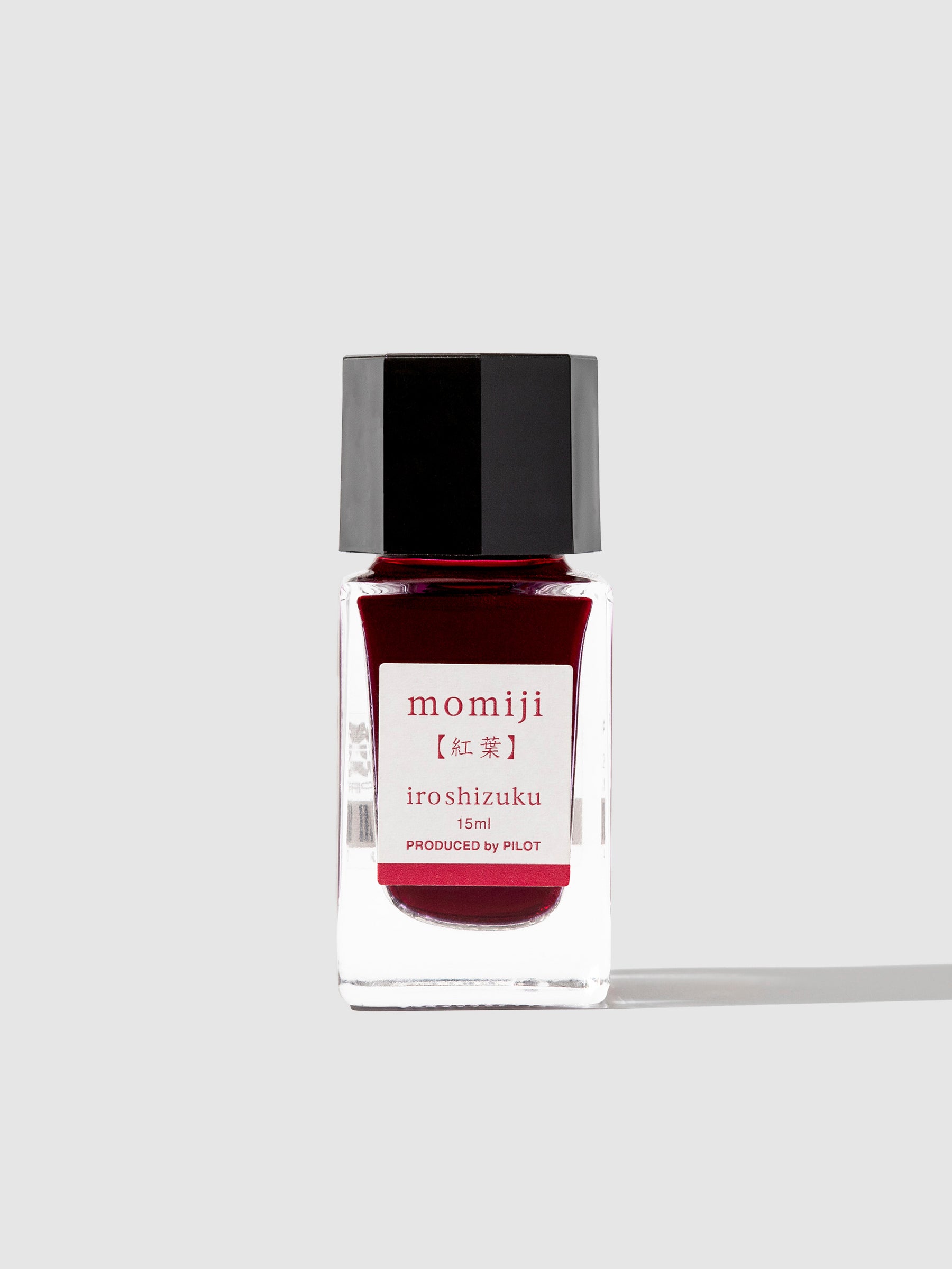 Ink bottle displayed on a neutral background. Color shown is momiji red.