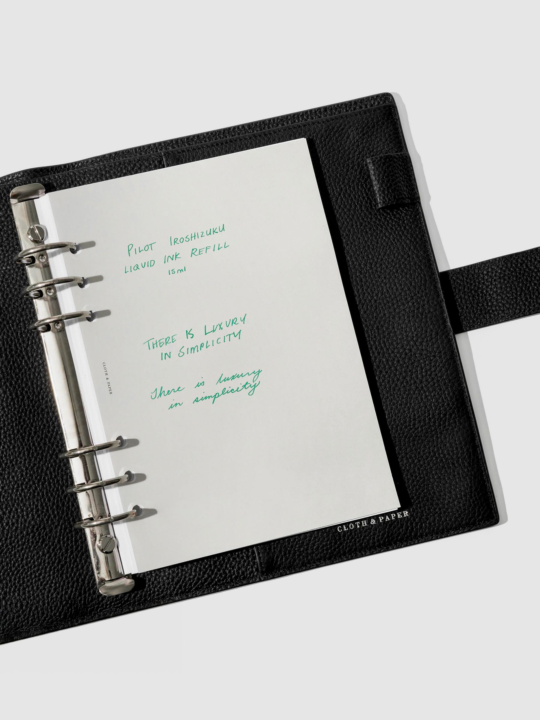 Pen test sheet showing ink in the color green.