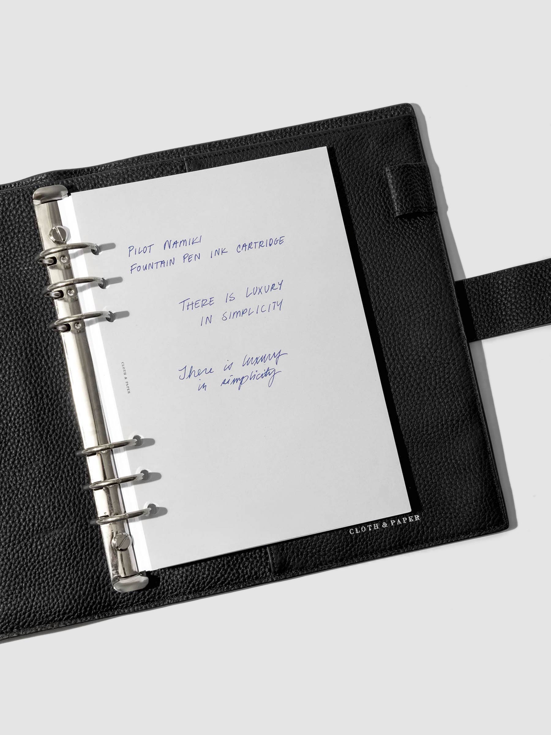 Pen testing sheet showing ink in the color blue.