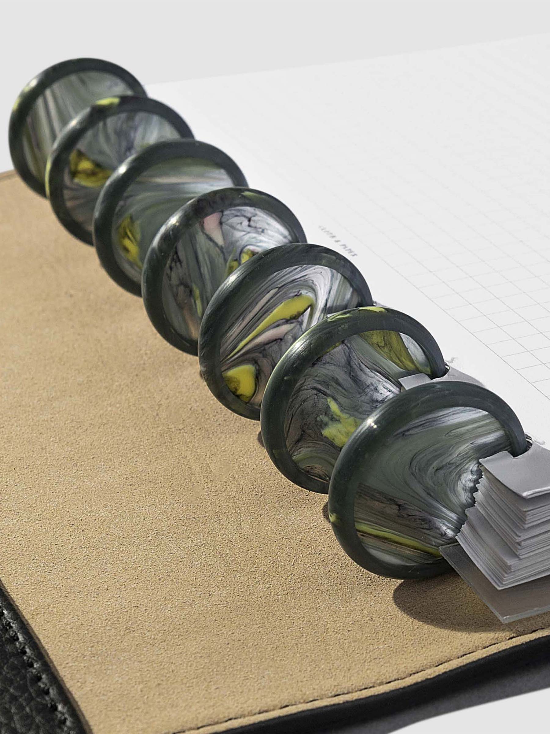 Set of 7 discs in use inside a leather folio.