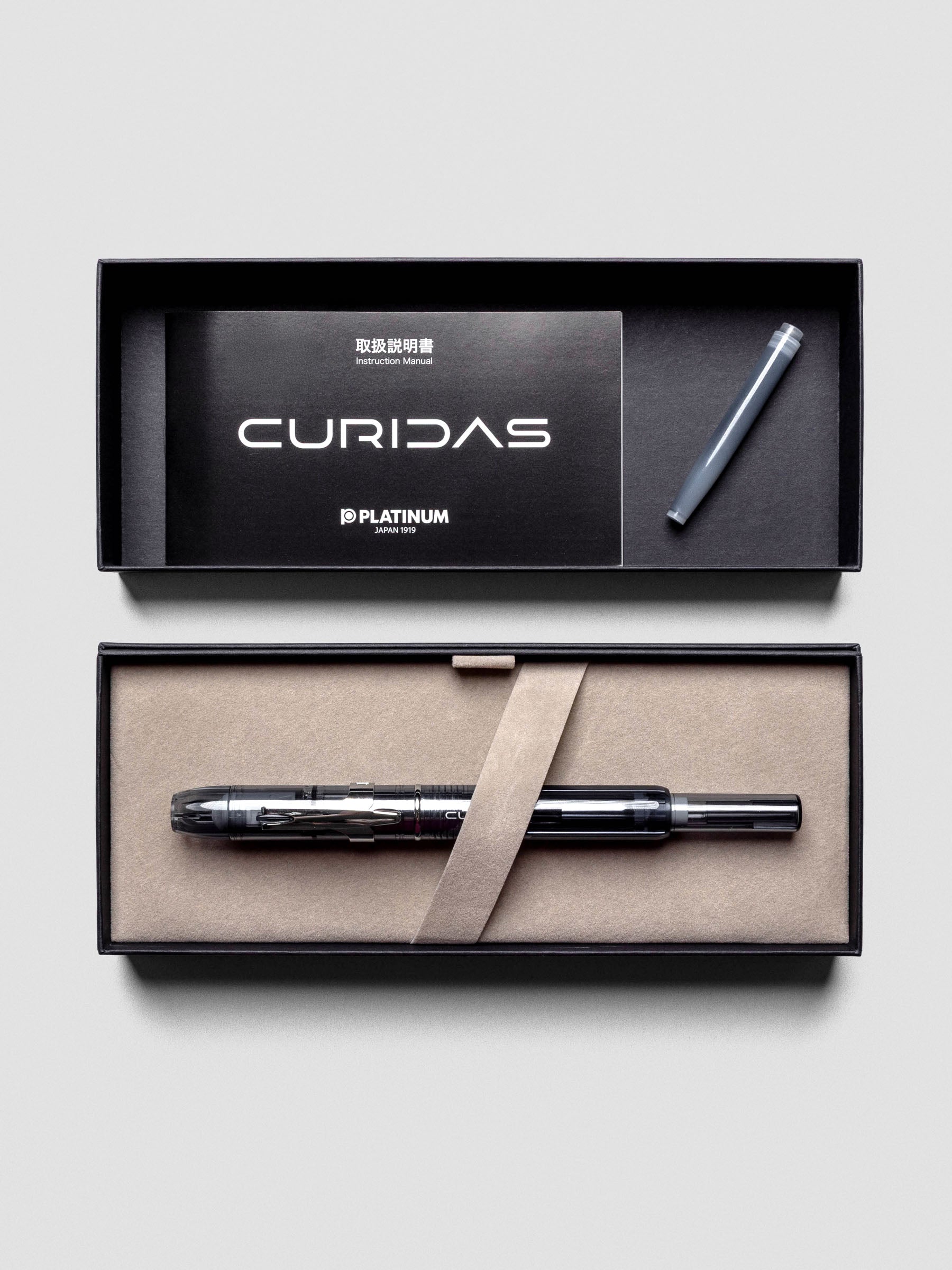Detail of Platinum Curidas Graphite Smoke Fountain Pen with extra fine nib extended.