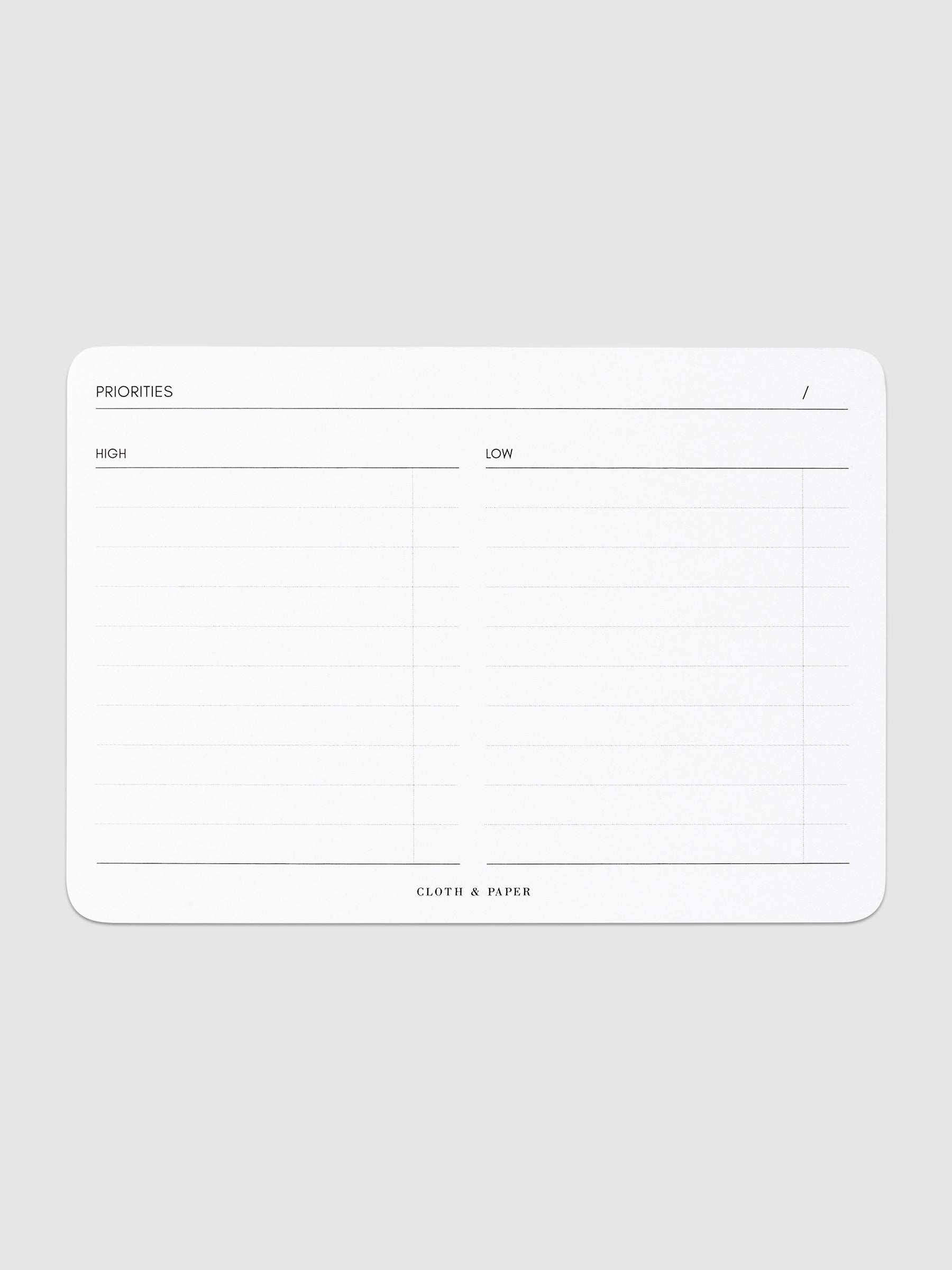 Priorities Notepad, Cloth and Paper. Notepad displayed on a neutral background.