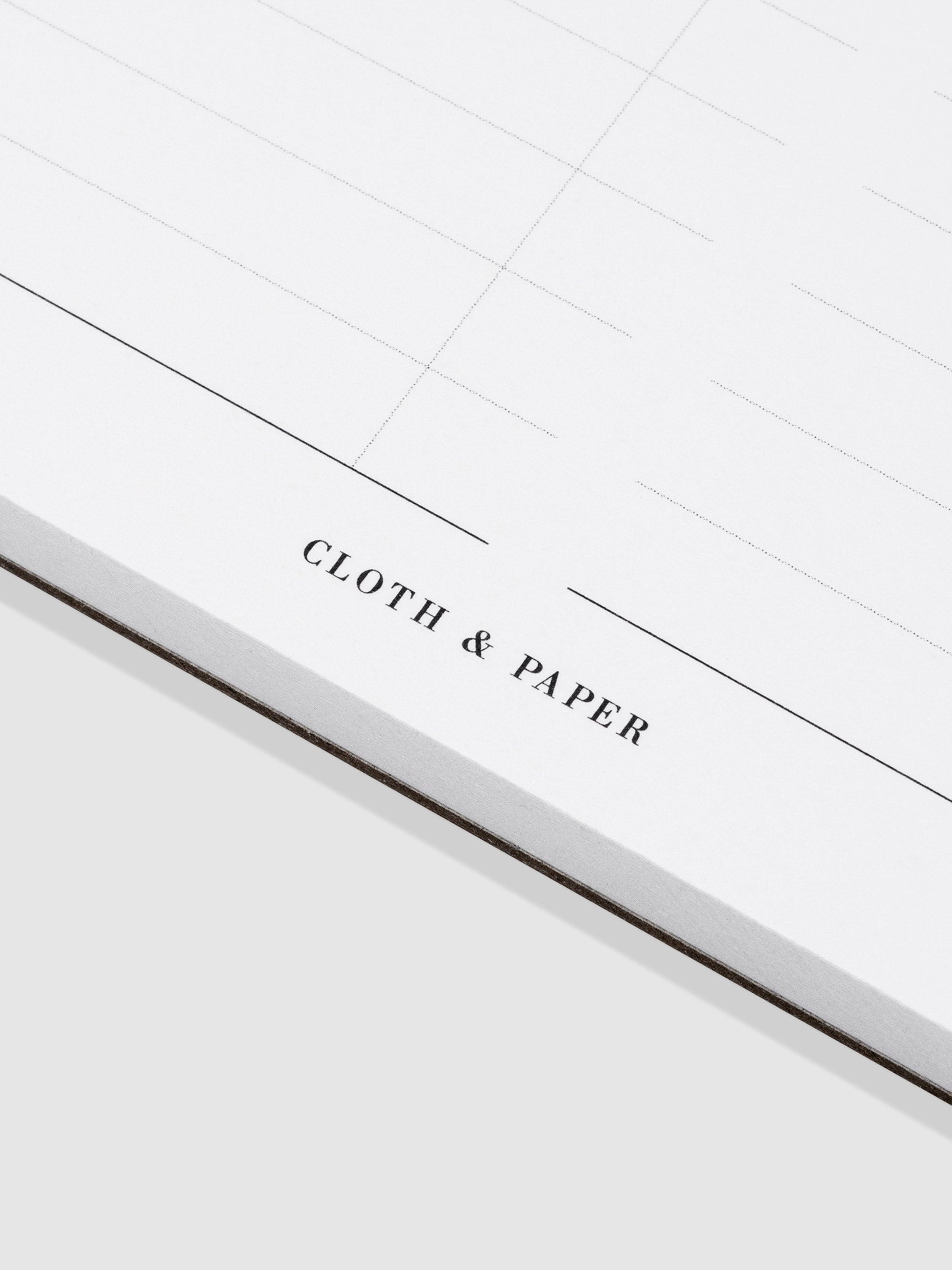 Cloth and Paper logo on the bottom of the notepad.