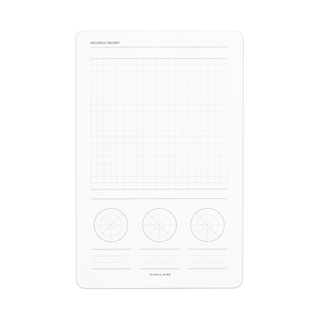 Progress Tracker Notepad, A5, Cloth and Paper. Notepad displayed on a white background.