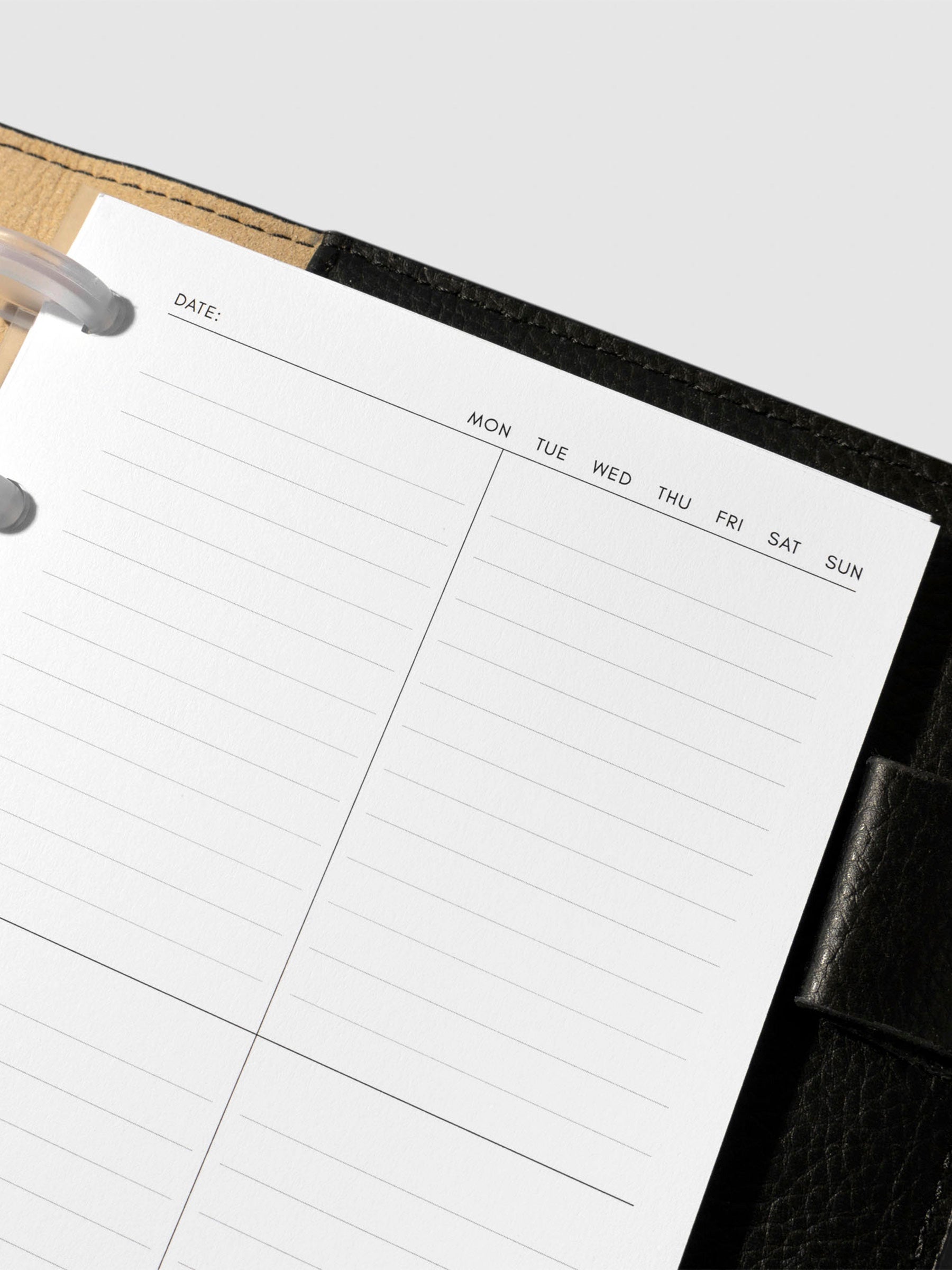 Insert in use inside a black leather planner.
