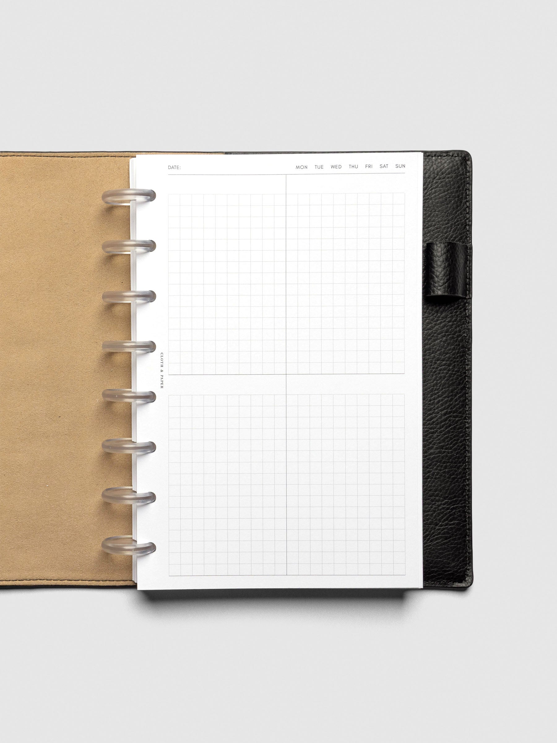 Insert in use inside a black leather planner.