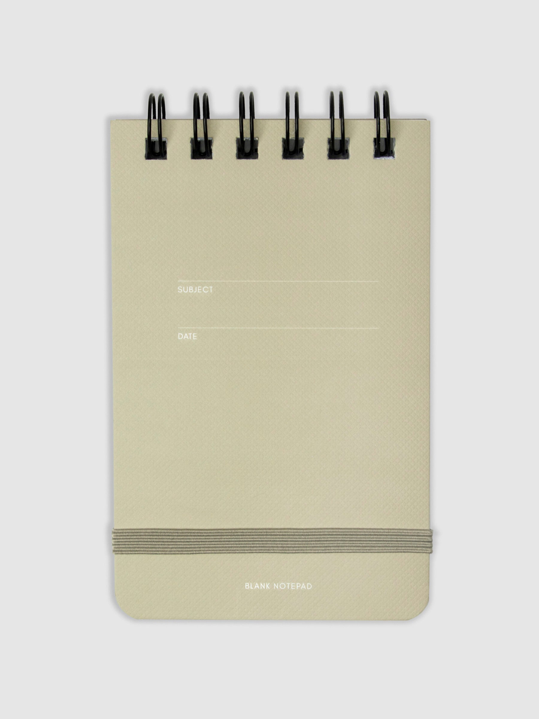 Blank notepad displayed on a neutral background.