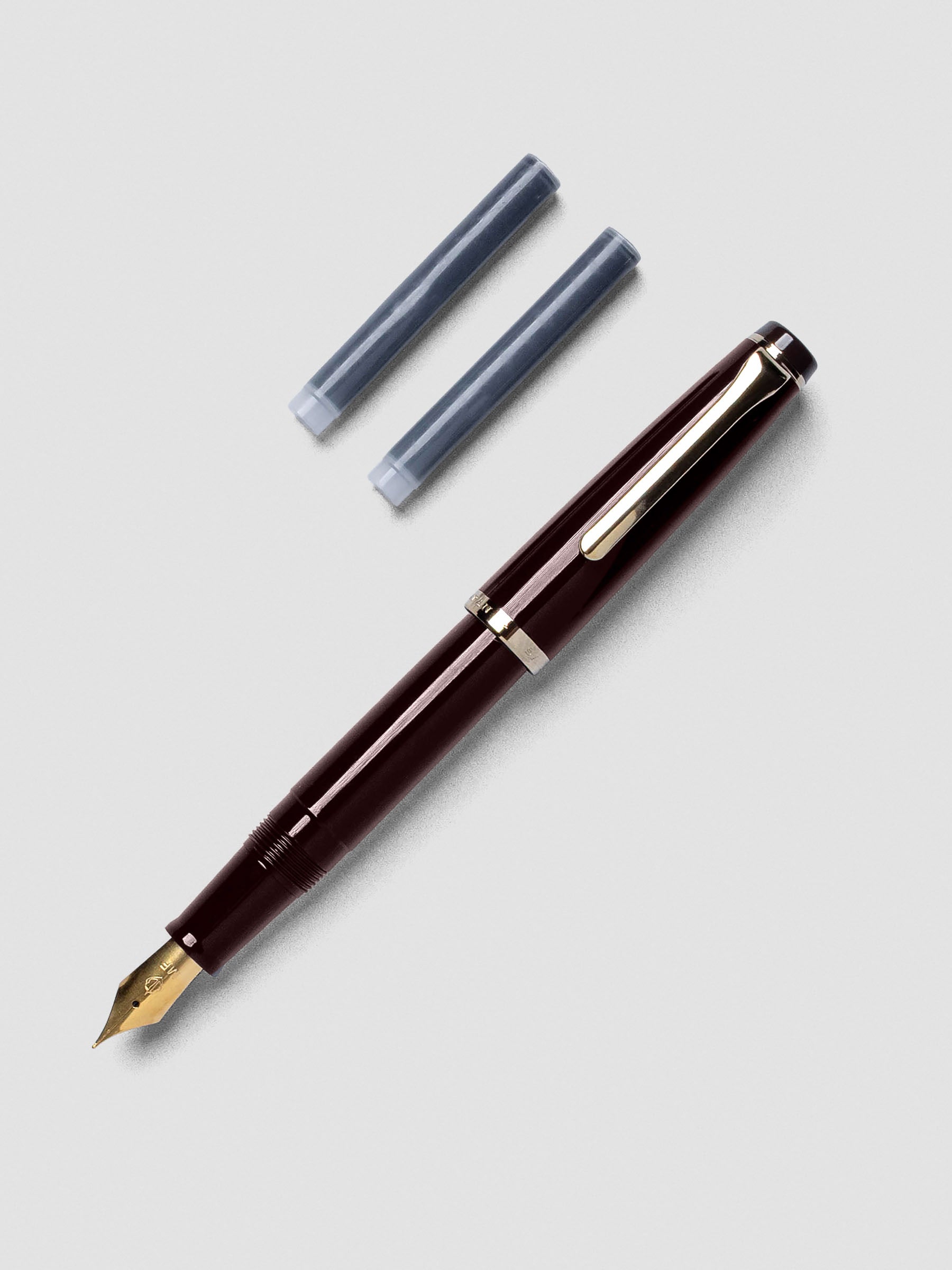 Close-up of Sailor Recle Fountain Pen Medium in Ruby Red showing nib detail.