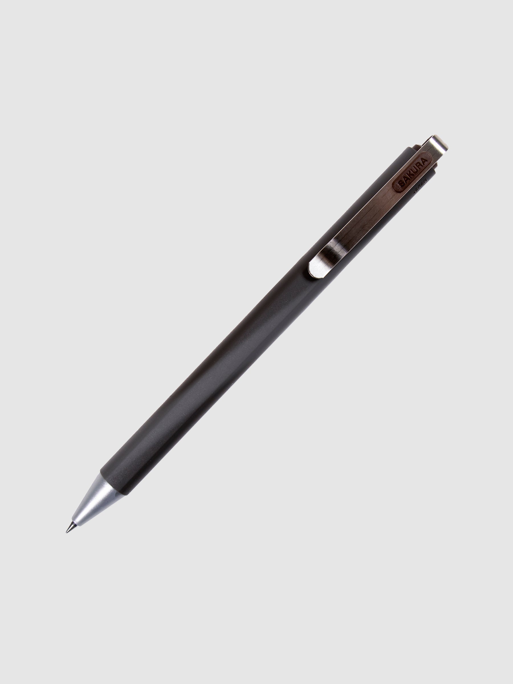 Pen in Brown Black turned to the right against a neutral background.