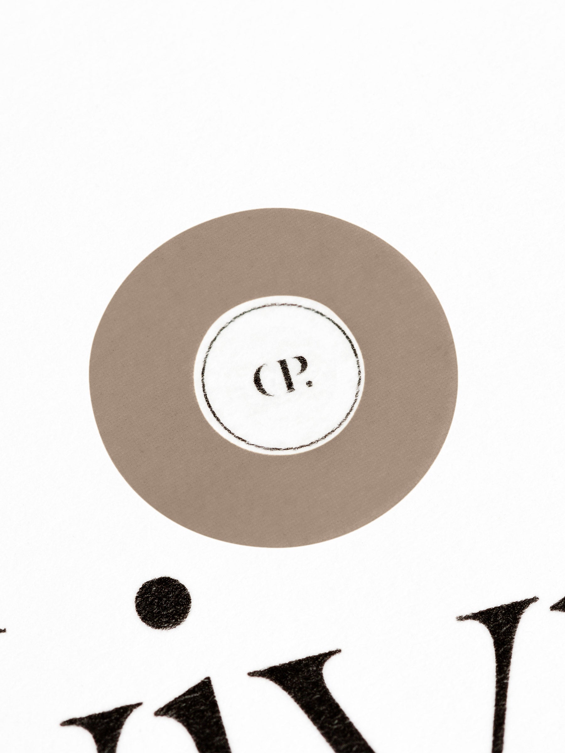 Medium sticker in use, placed over the Cloth and Paper logo on a sheet of paper.