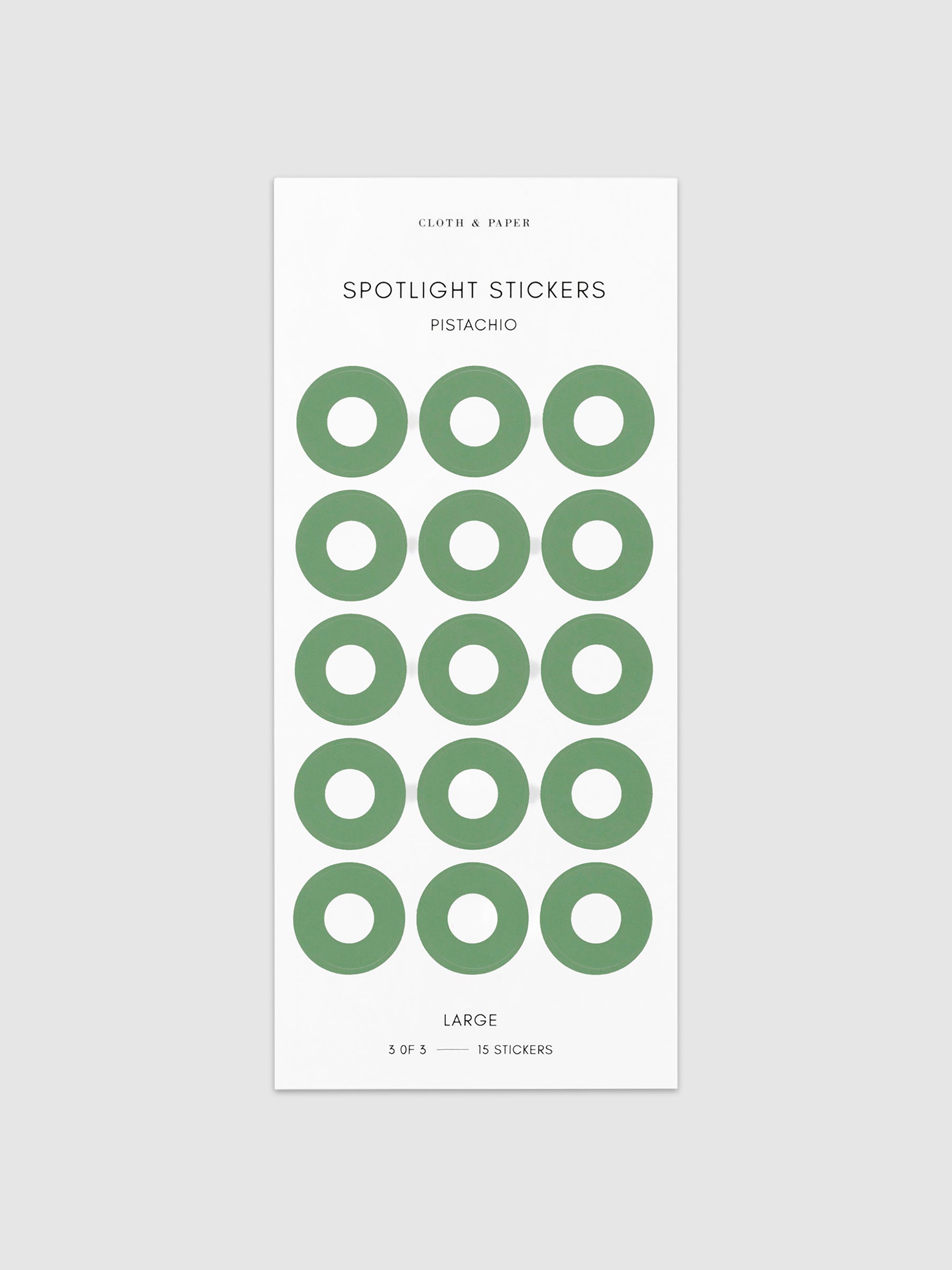 Large sticker in its packaging displayed on a neutral background. Pictured color is pistachio.