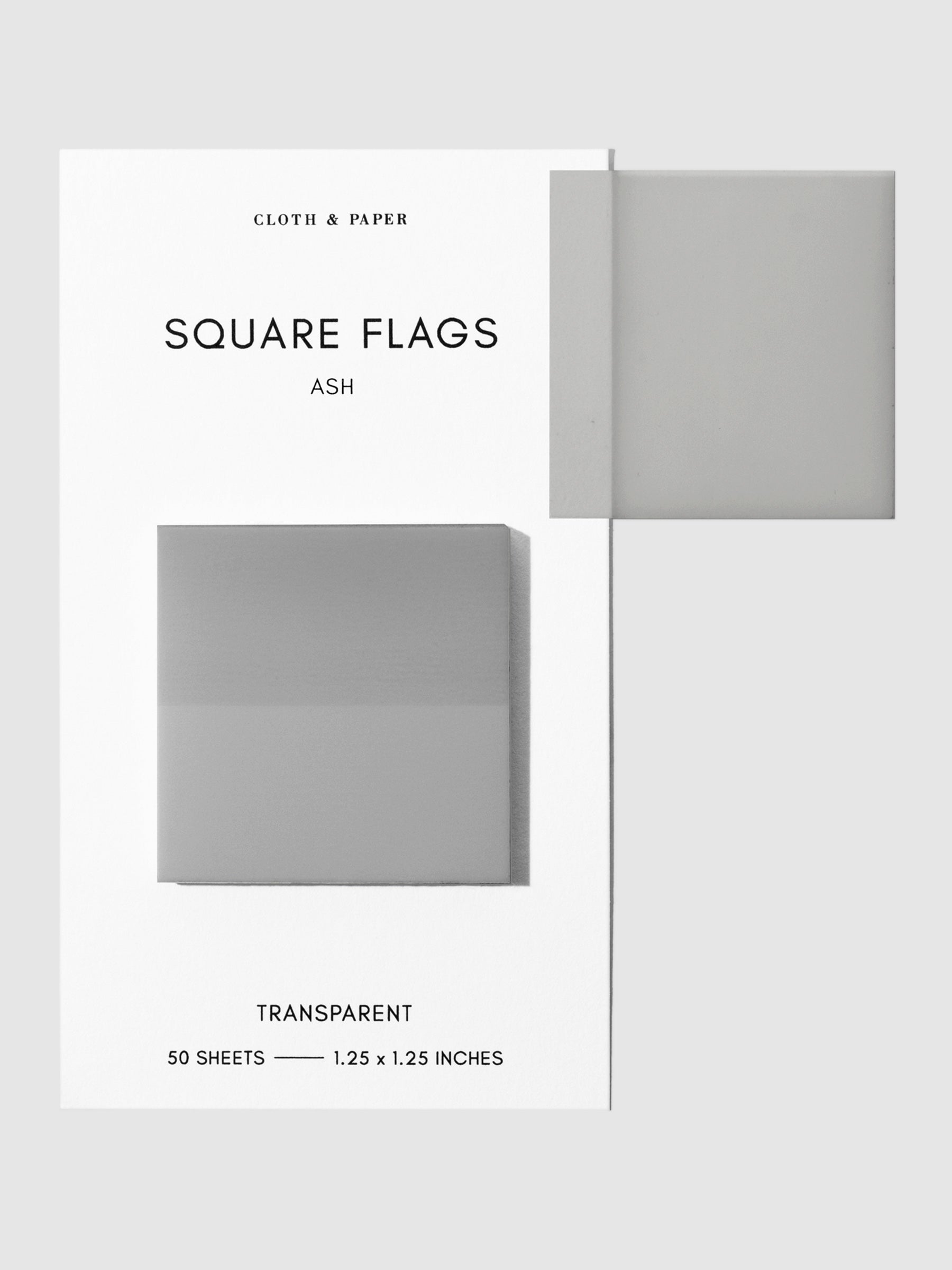 Square Page flag on their backing with one flag removed and attached to the backing to show its transparency. Color shown is Ash.