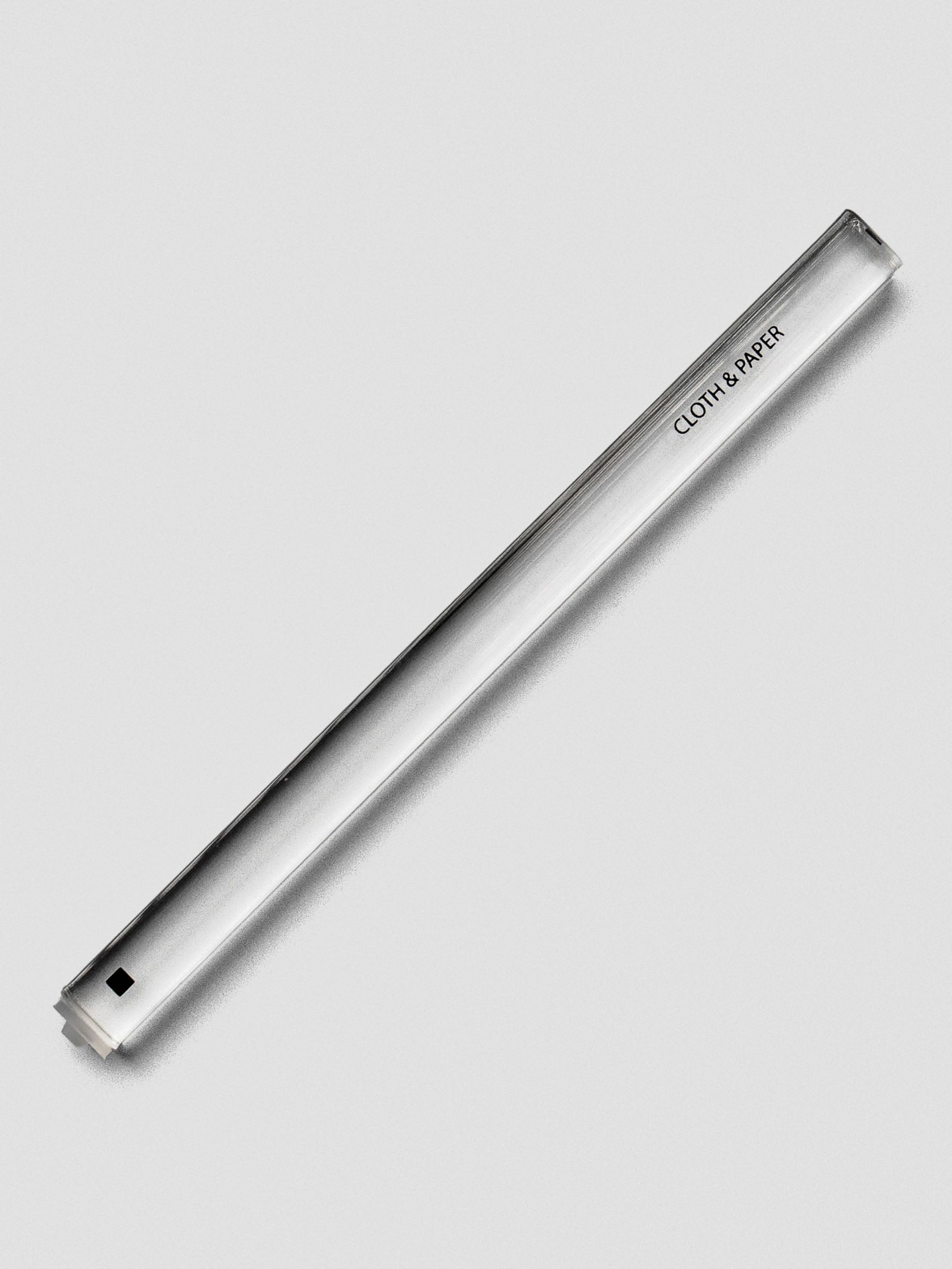 Single clear acrylic stamp stick with a filled black square icon on the end and the Cloth & Paper logo on the side.