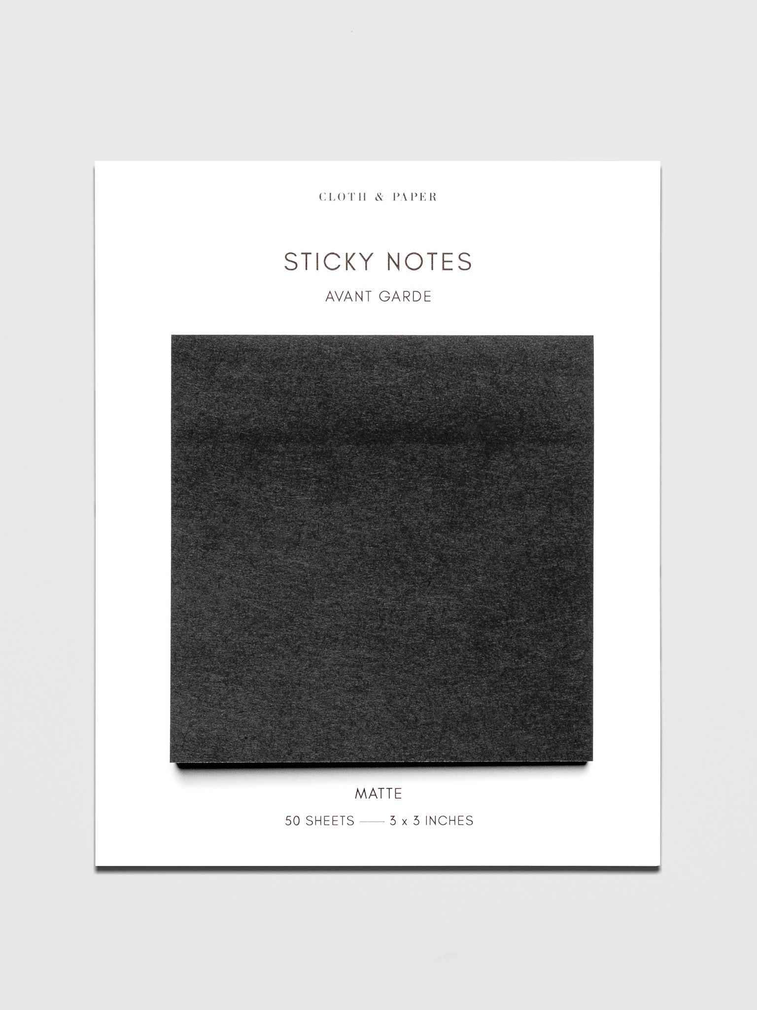 Avant Garde Sticky Notes, Cloth and Paper. Small sticky notes on their backing against a neutral background.