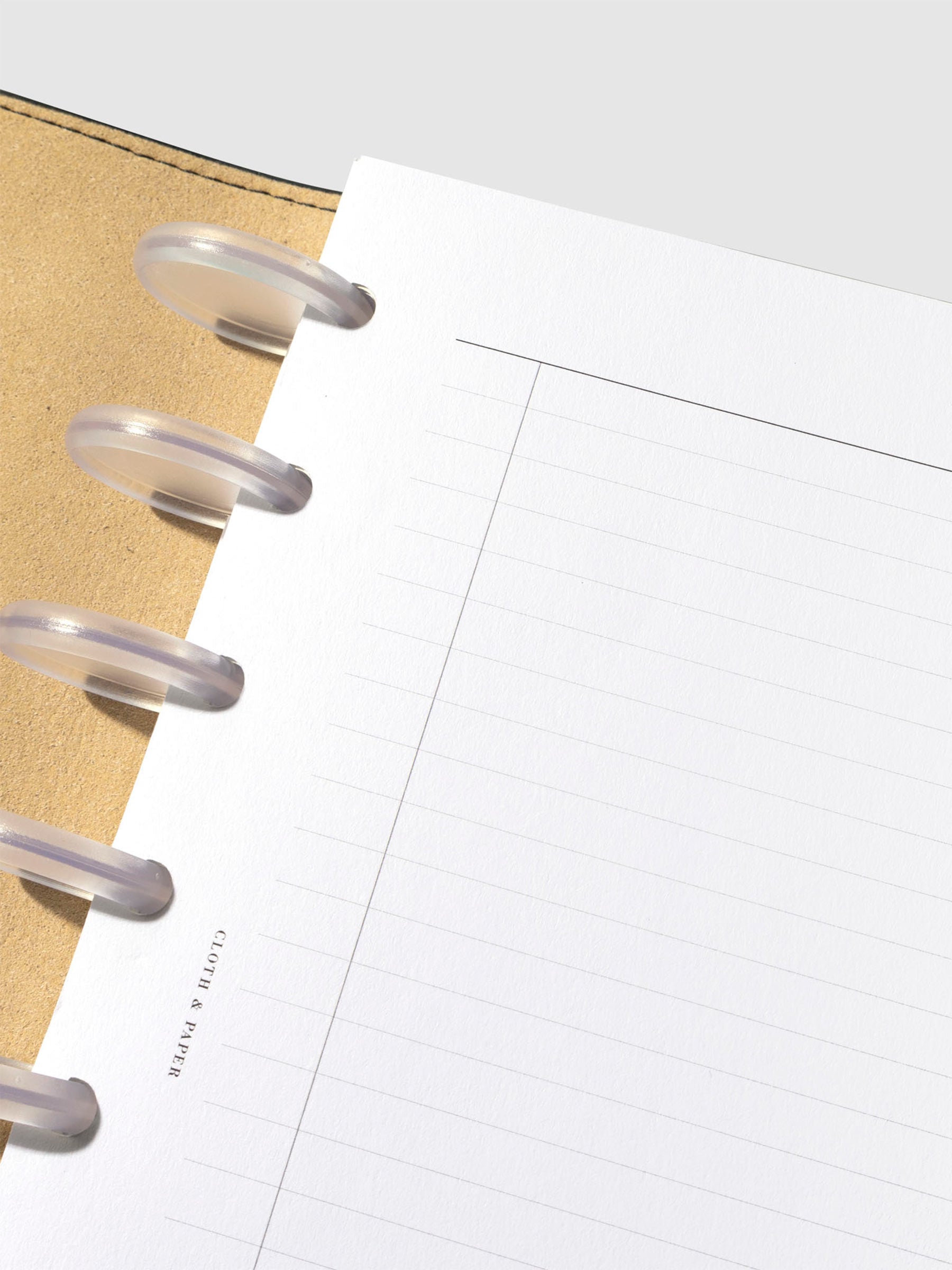 Closeup of a top left corner of an insert in a planner.