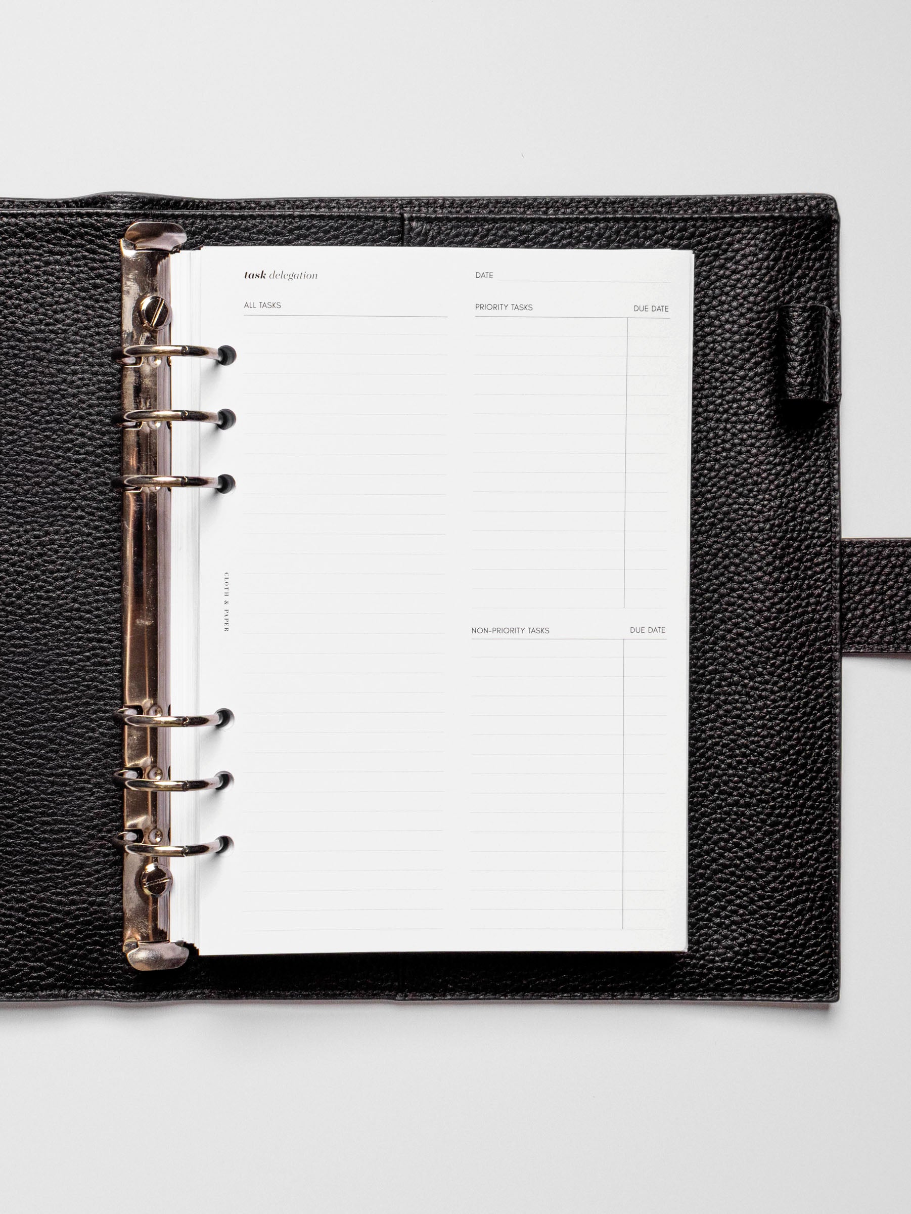 Insert in use inside a black leather planner.