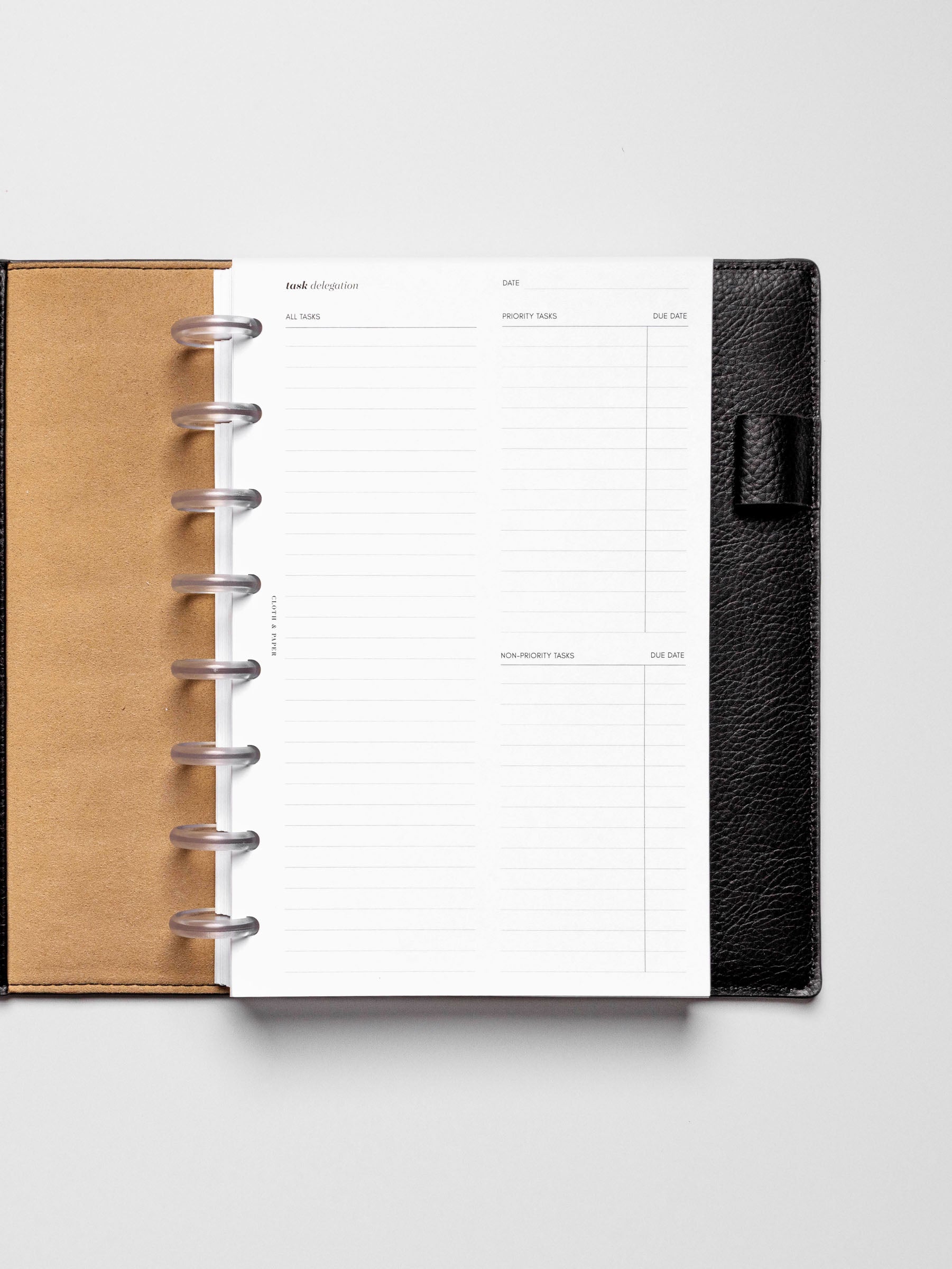 Insert in use inside a black leather planner.