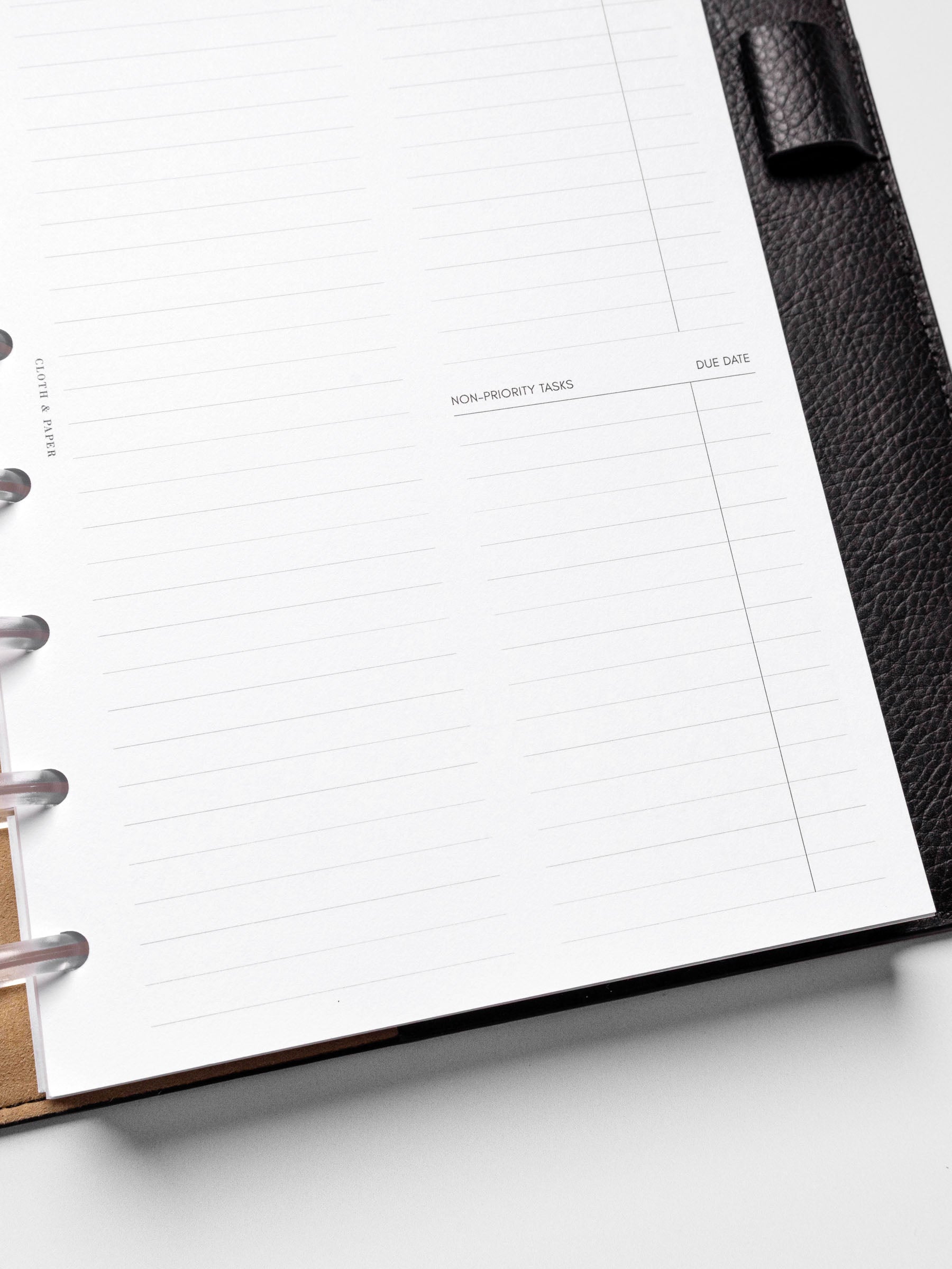 Insert in use inside a black leather planner.