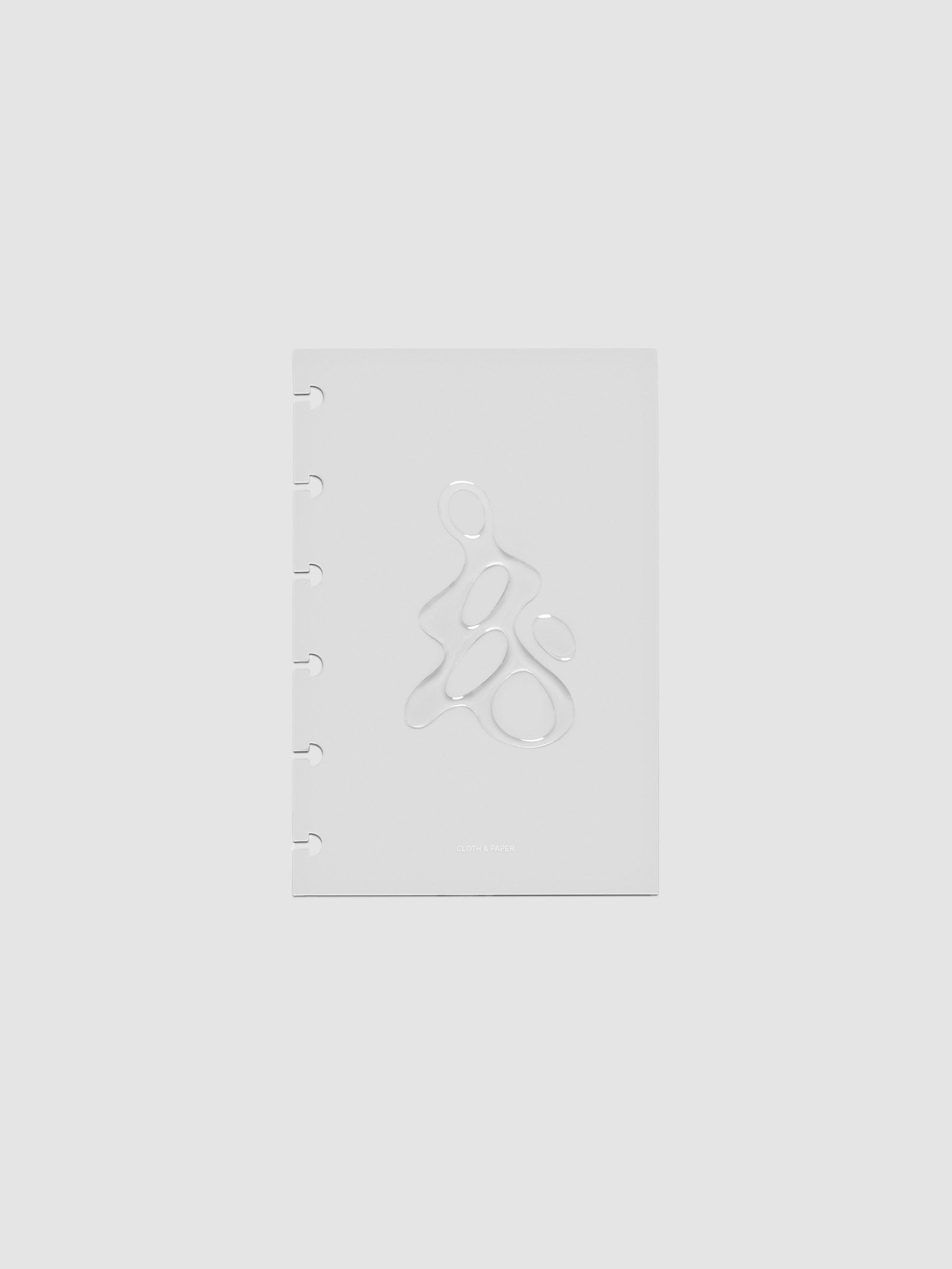 Light grey, semi-transparent, and glossy plastic planner dashboard with organic raised shape design in size CP Petite on a neutral background.