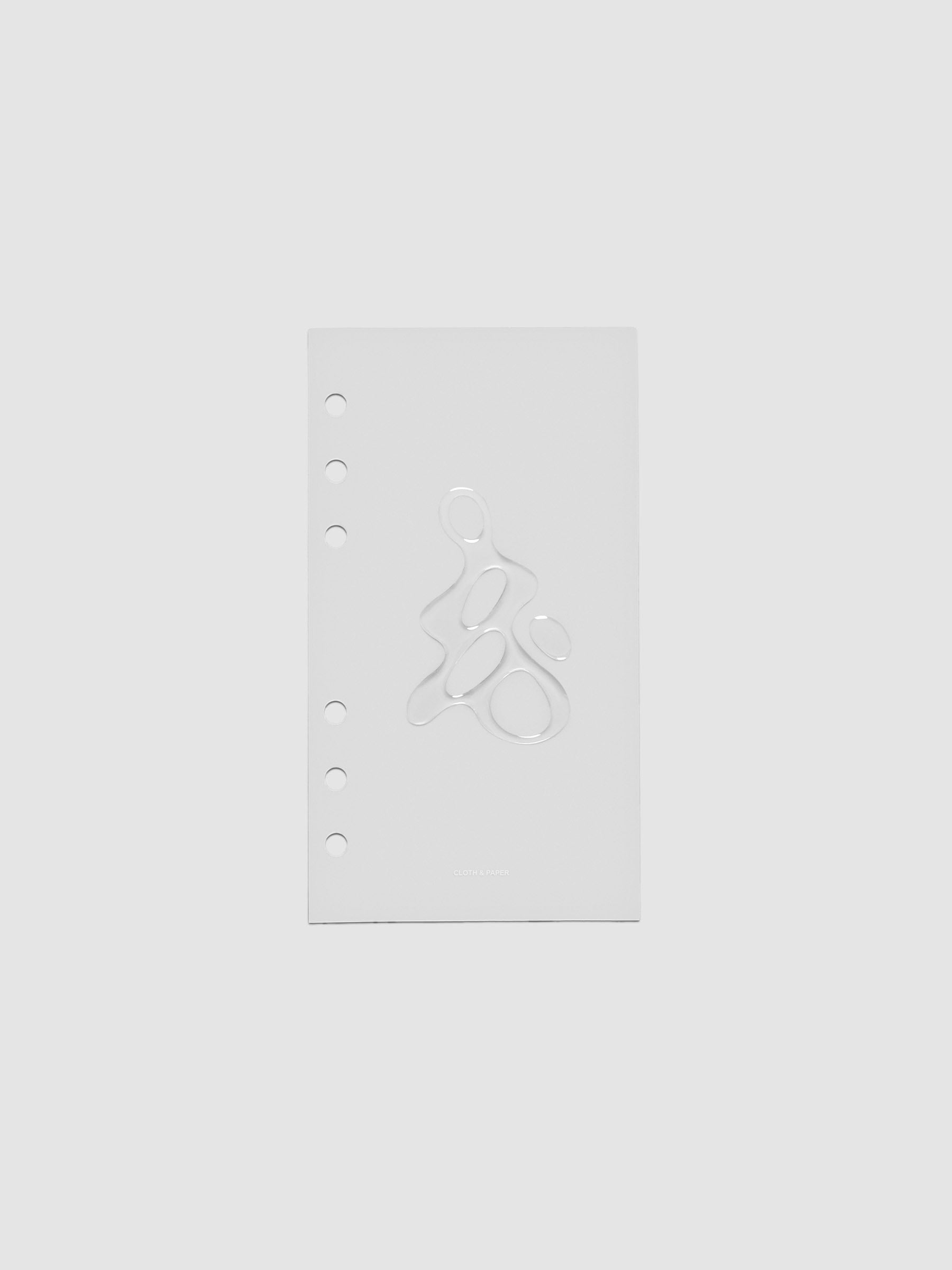 Light grey, semi-transparent, and glossy plastic planner dashboard with organic raised shape design in size Personal on a neutral background.