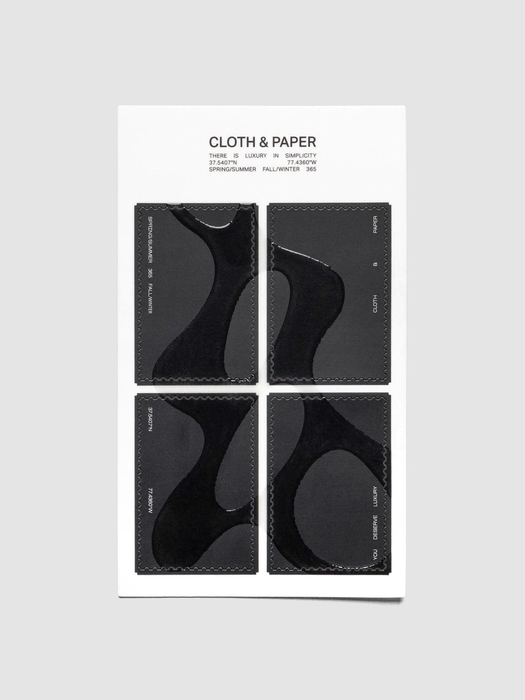 One sheet of four stamp shaped stickers in black with a gloss organic shape design.