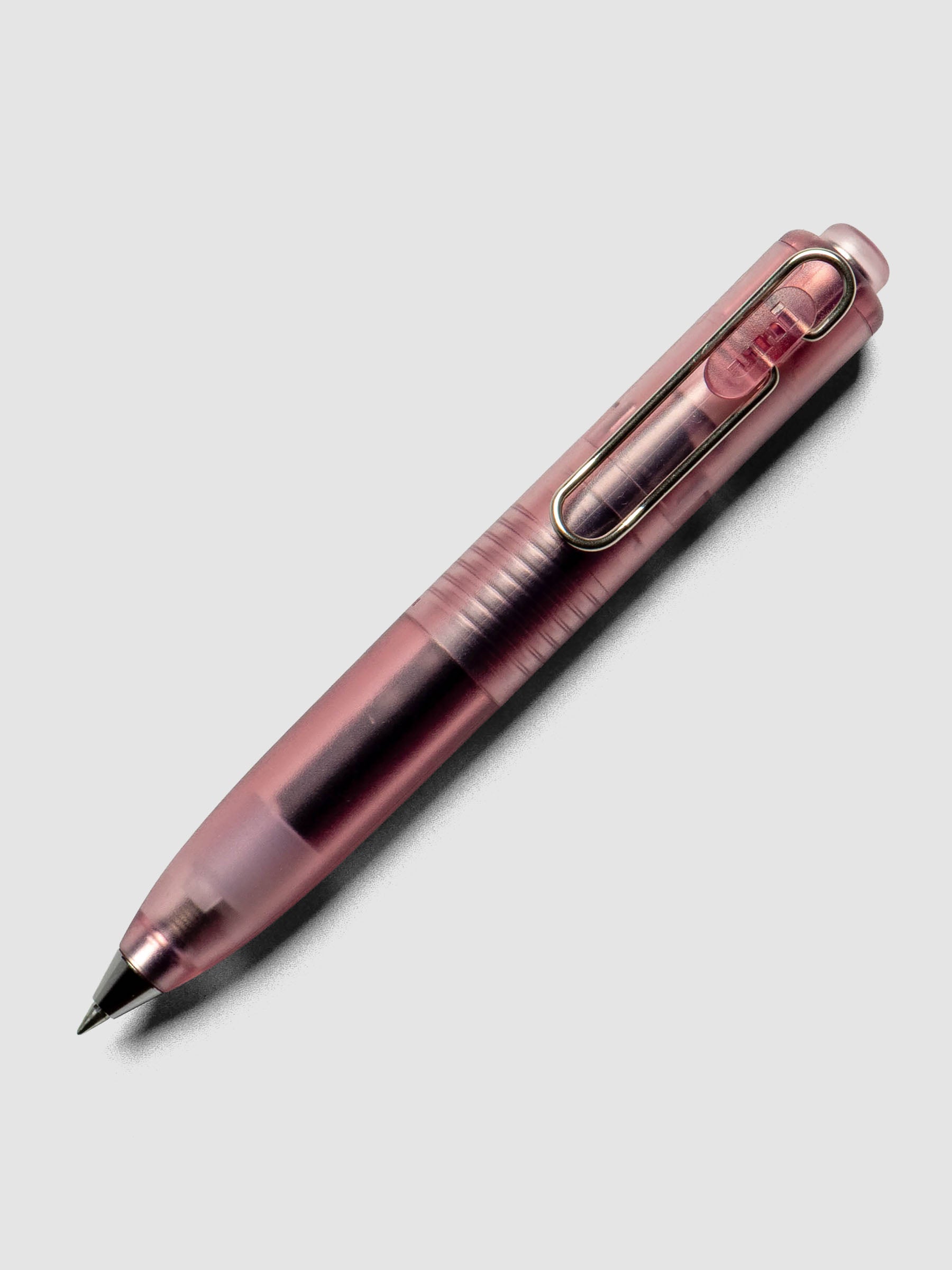 Uniball One P Flavor Jelly Pen in Raspberry on a neutral background.