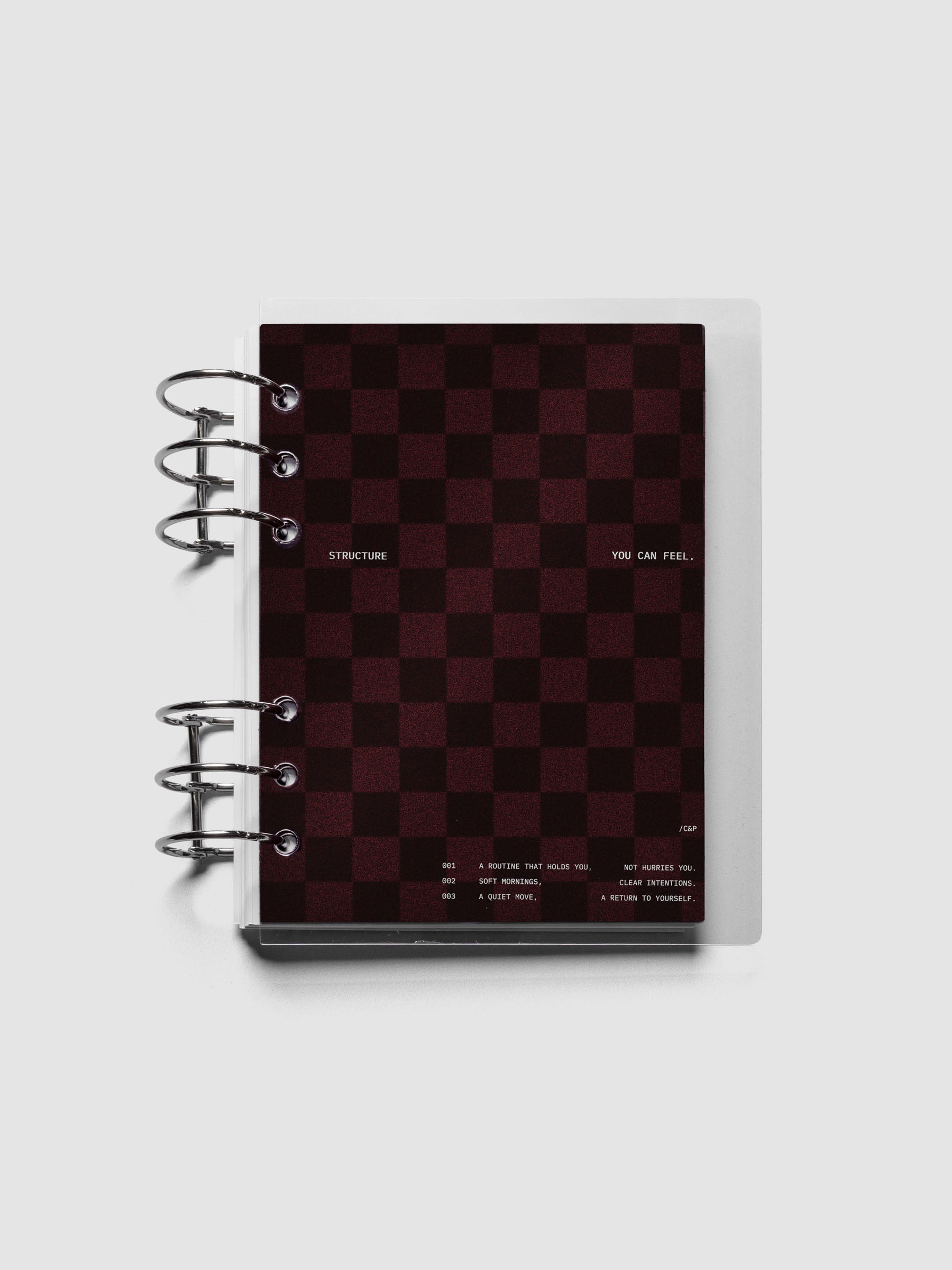Personal Wide sized velvet checkered dashboard in the color Bordeaux with crystal clear planner dashboard shown ringbound.